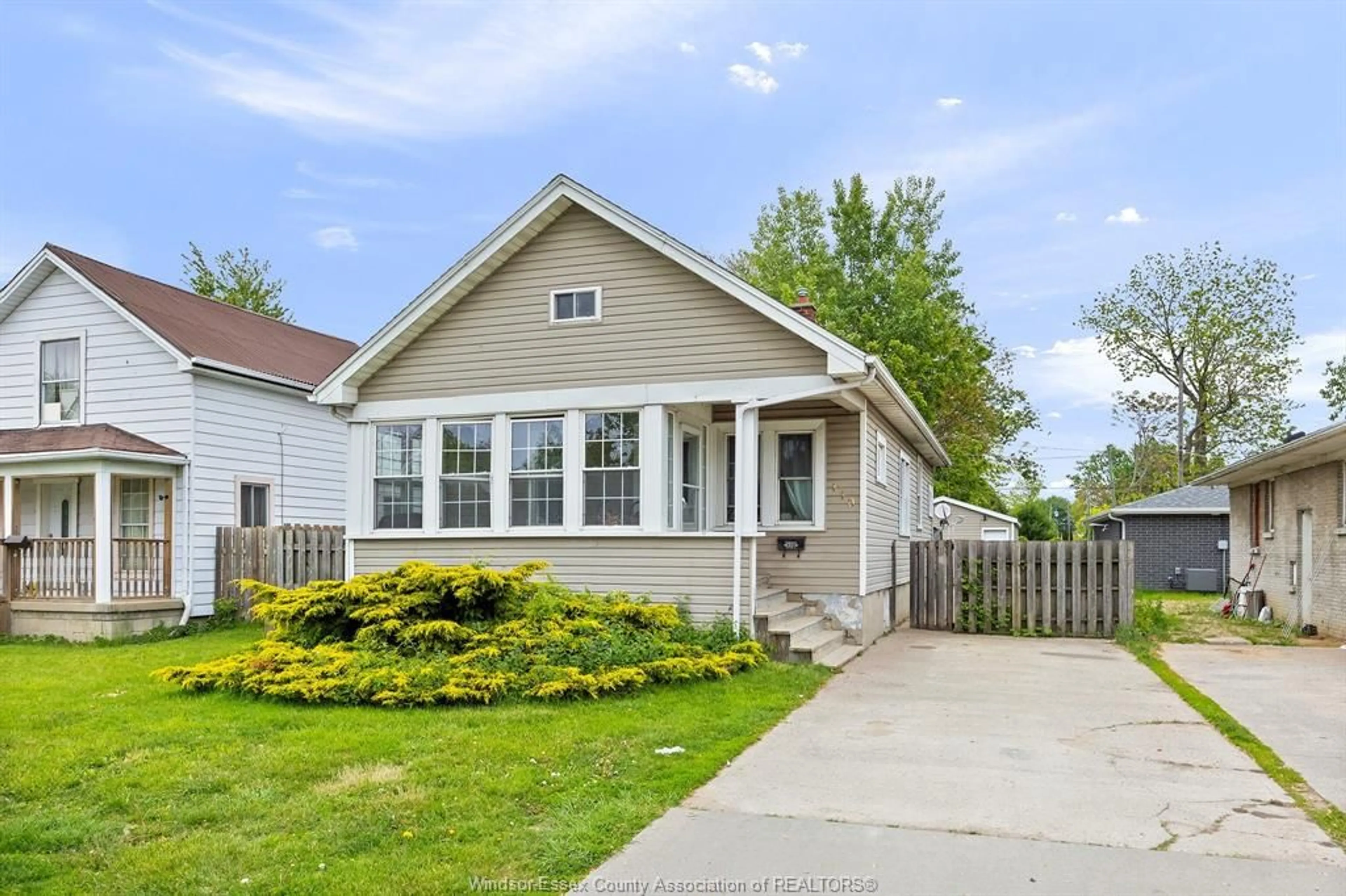 Home with vinyl exterior material, street for 110 ERIE St, Leamington Ontario N8H 3B6