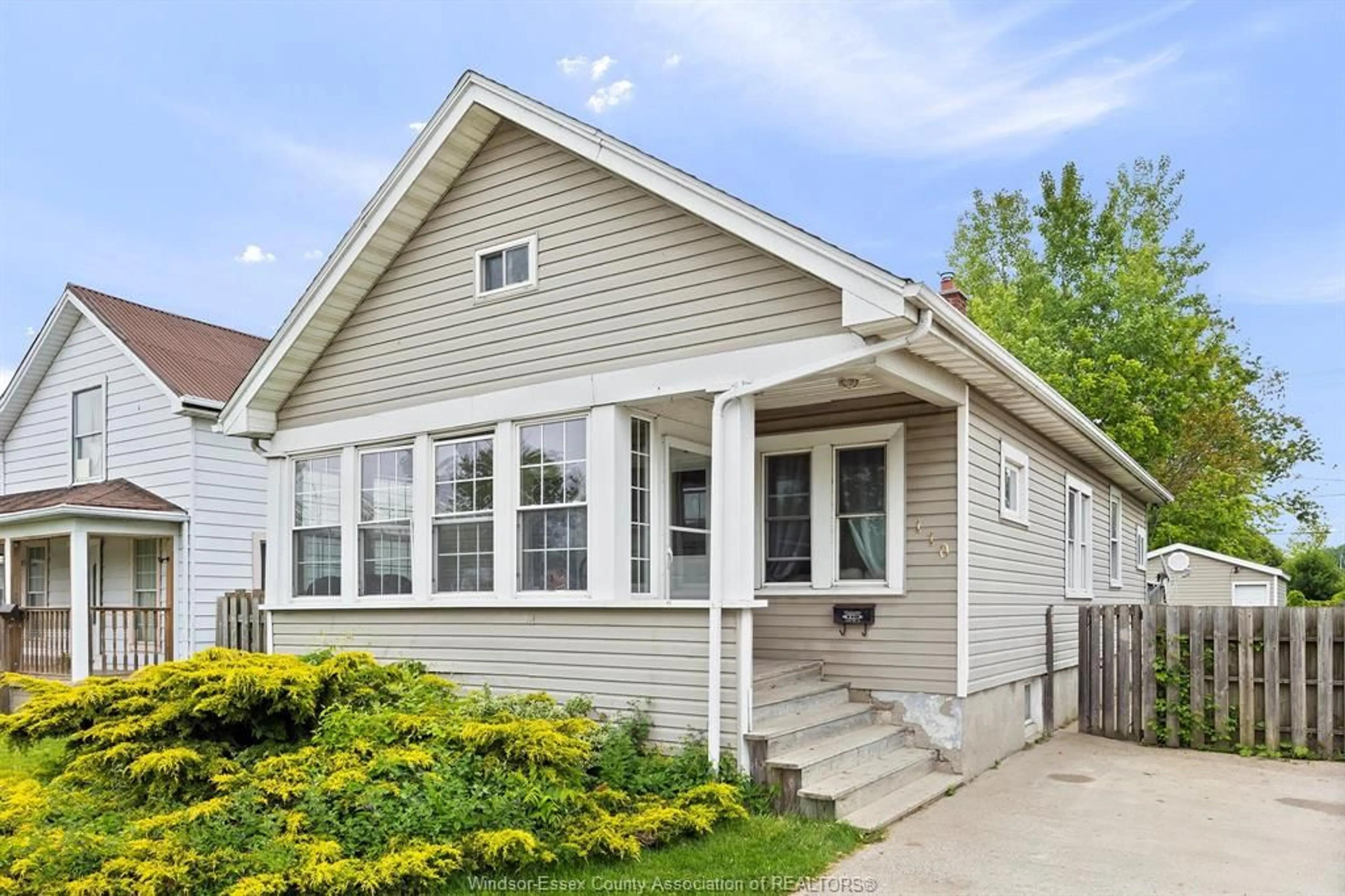 Home with vinyl exterior material, street for 110 ERIE St, Leamington Ontario N8H 3B6