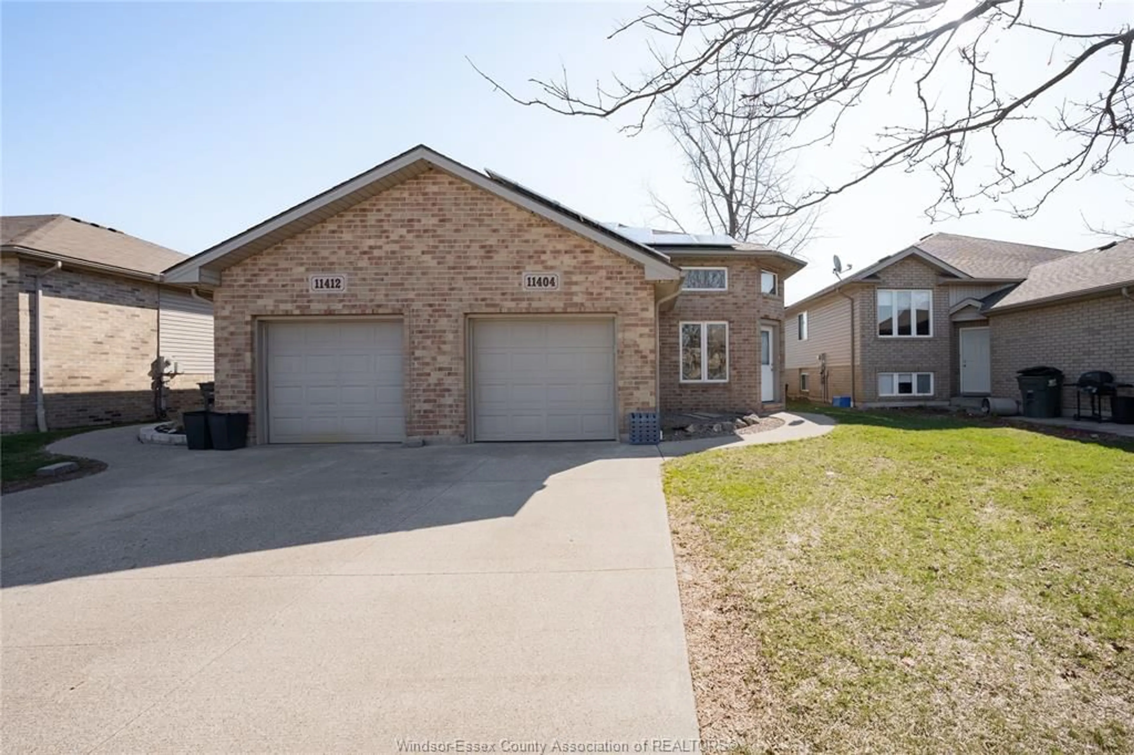 Home with brick exterior material, street for 11404 TIMBER BAY Cres, Windsor Ontario N8R 2K9