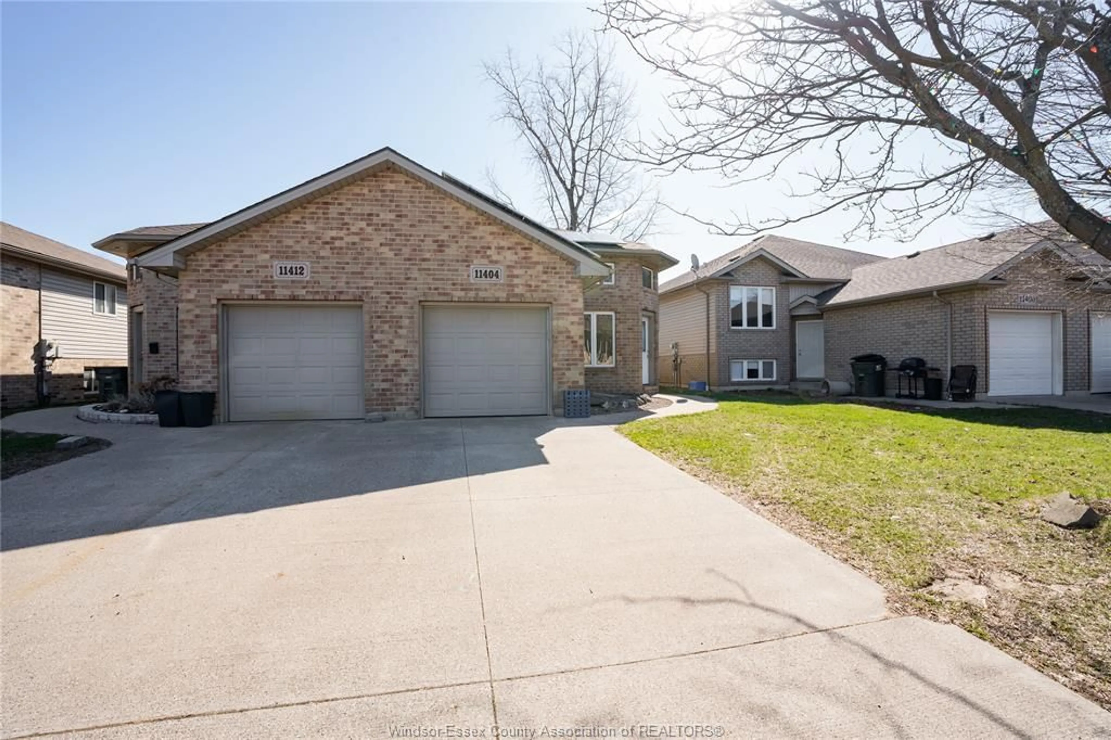 Home with brick exterior material, street for 11404 TIMBER BAY Cres, Windsor Ontario N8R 2K9