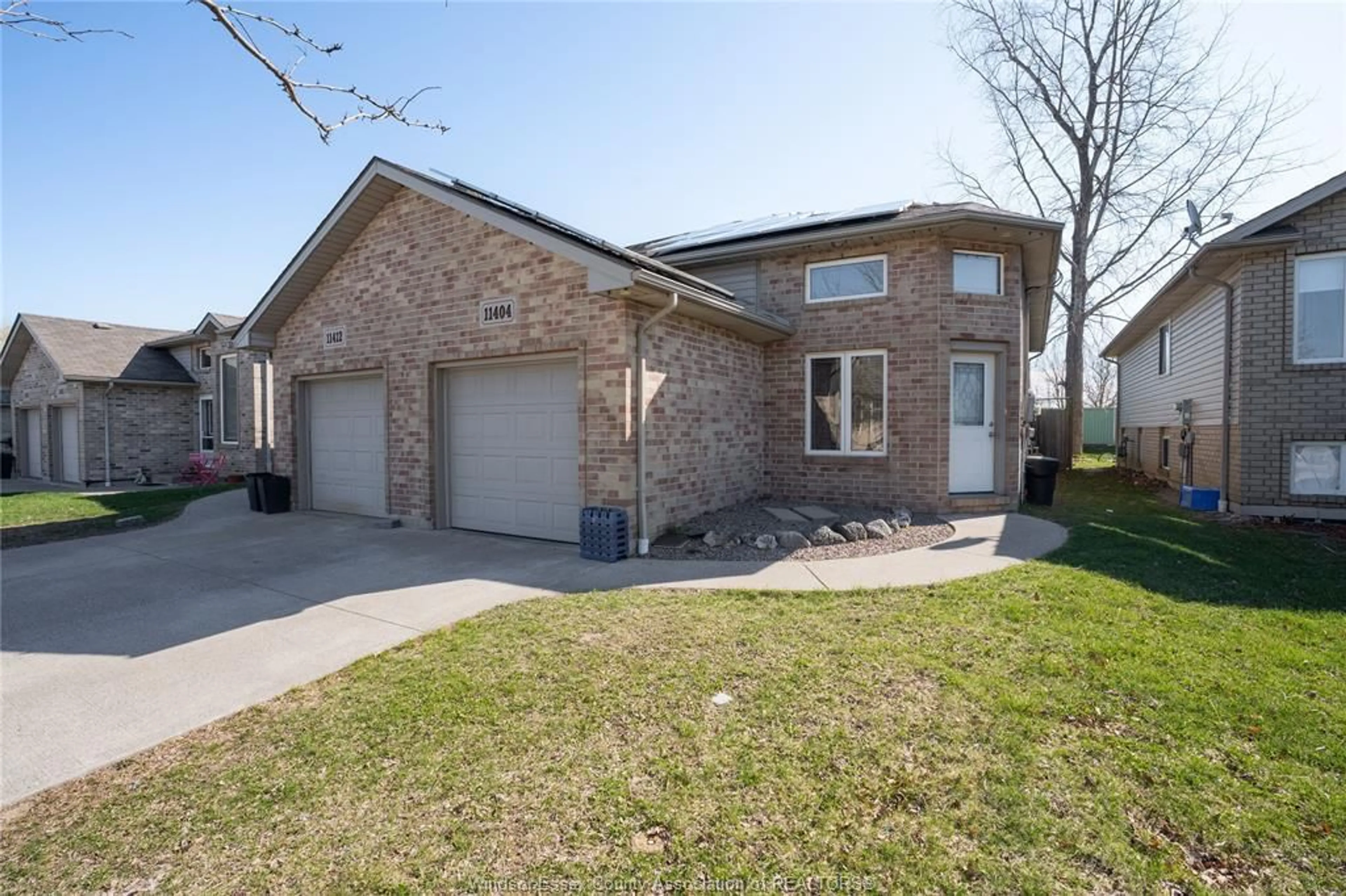 Home with brick exterior material, street for 11404 TIMBER BAY Cres, Windsor Ontario N8R 2K9