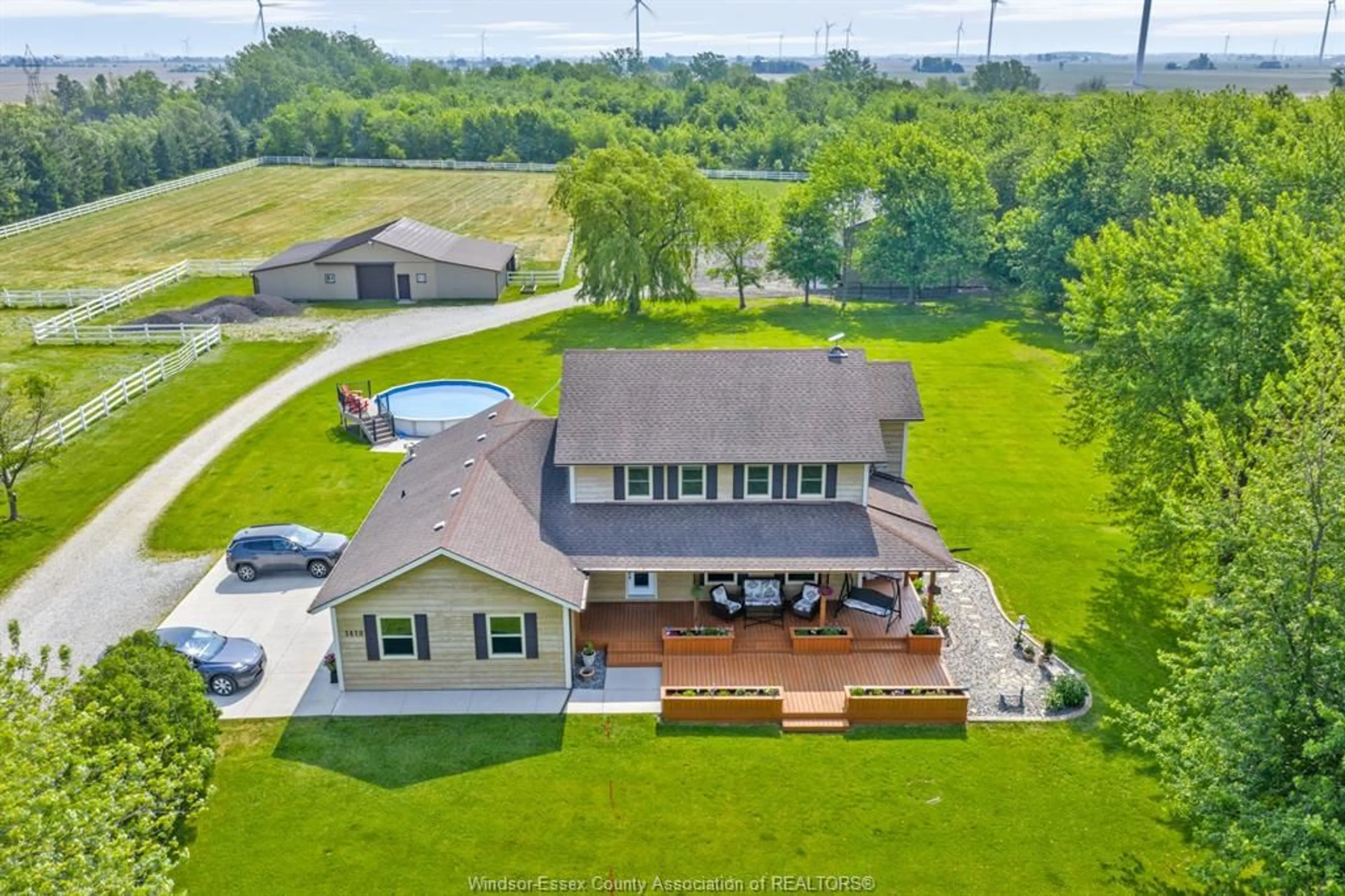 A pic from outside/outdoor area/front of a property/back of a property/a pic from drone, water/lake/river/ocean view for 1418 COUNTY RD 31, Lakeshore Ontario N0R 1S0