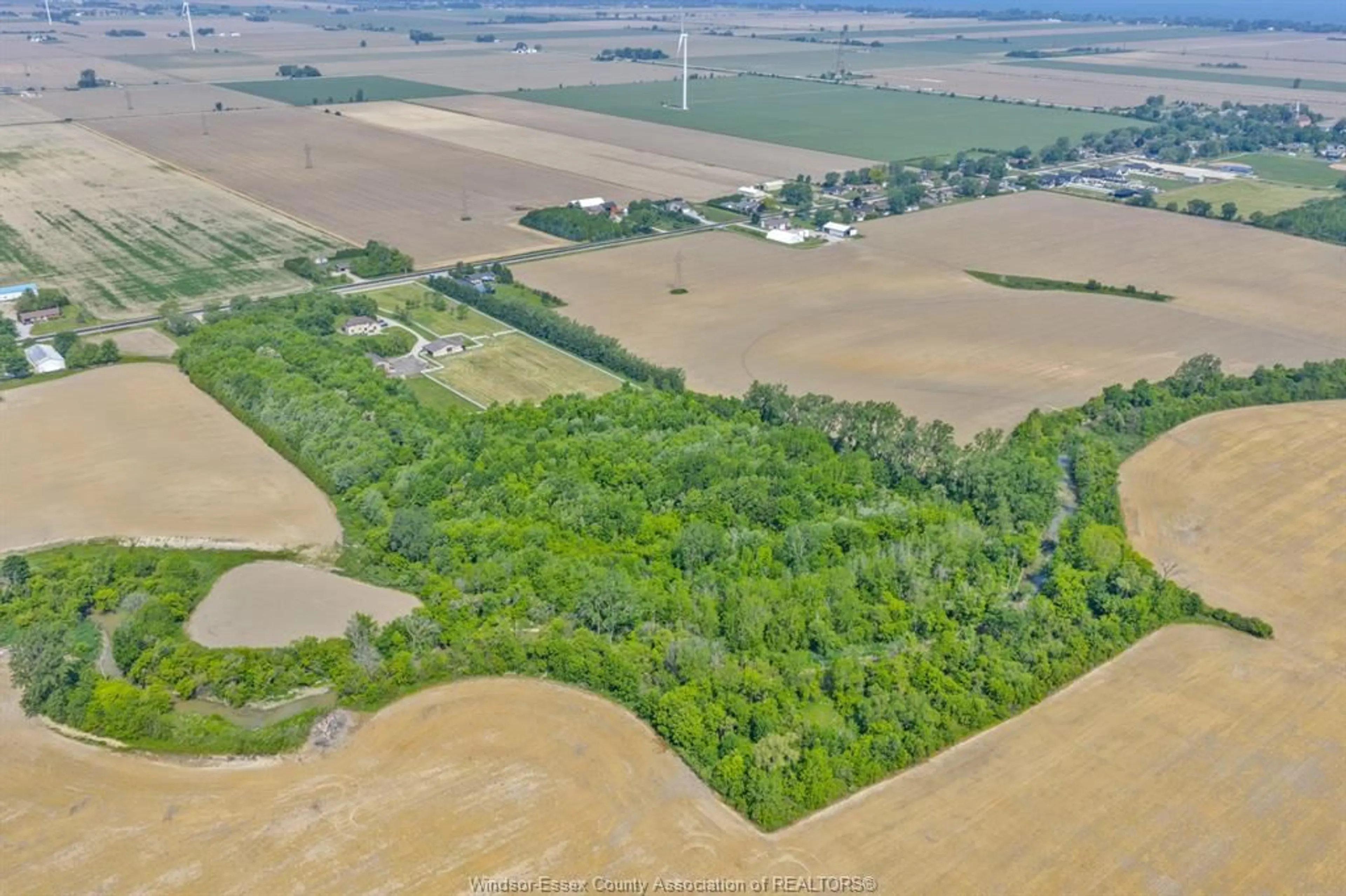 A pic from outside/outdoor area/front of a property/back of a property/a pic from drone, forest/trees view for 1418 COUNTY RD 31, Lakeshore Ontario N0R 1S0