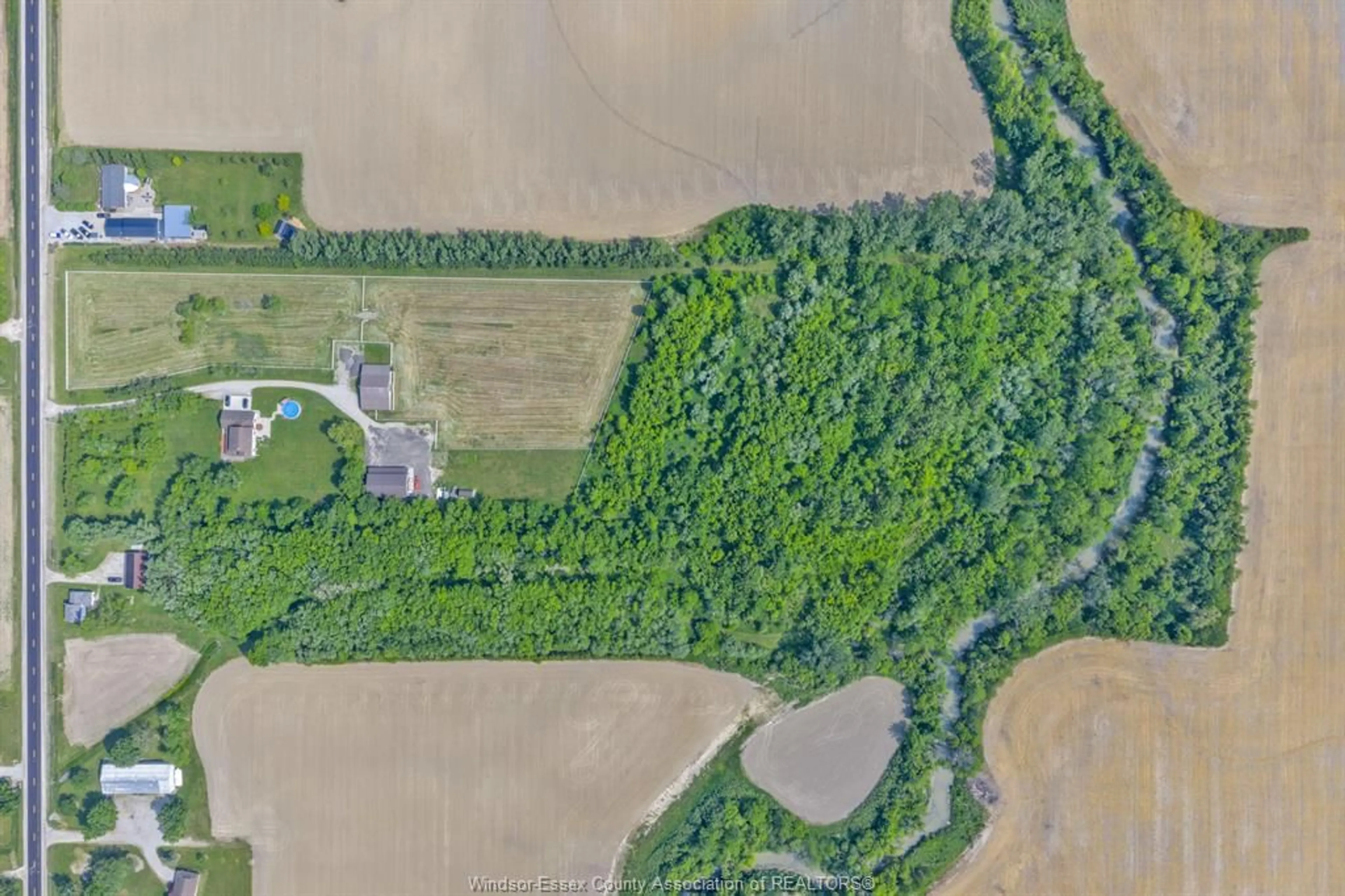 A pic from outside/outdoor area/front of a property/back of a property/a pic from drone, forest/trees view for 1418 COUNTY RD 31, Lakeshore Ontario N0R 1S0