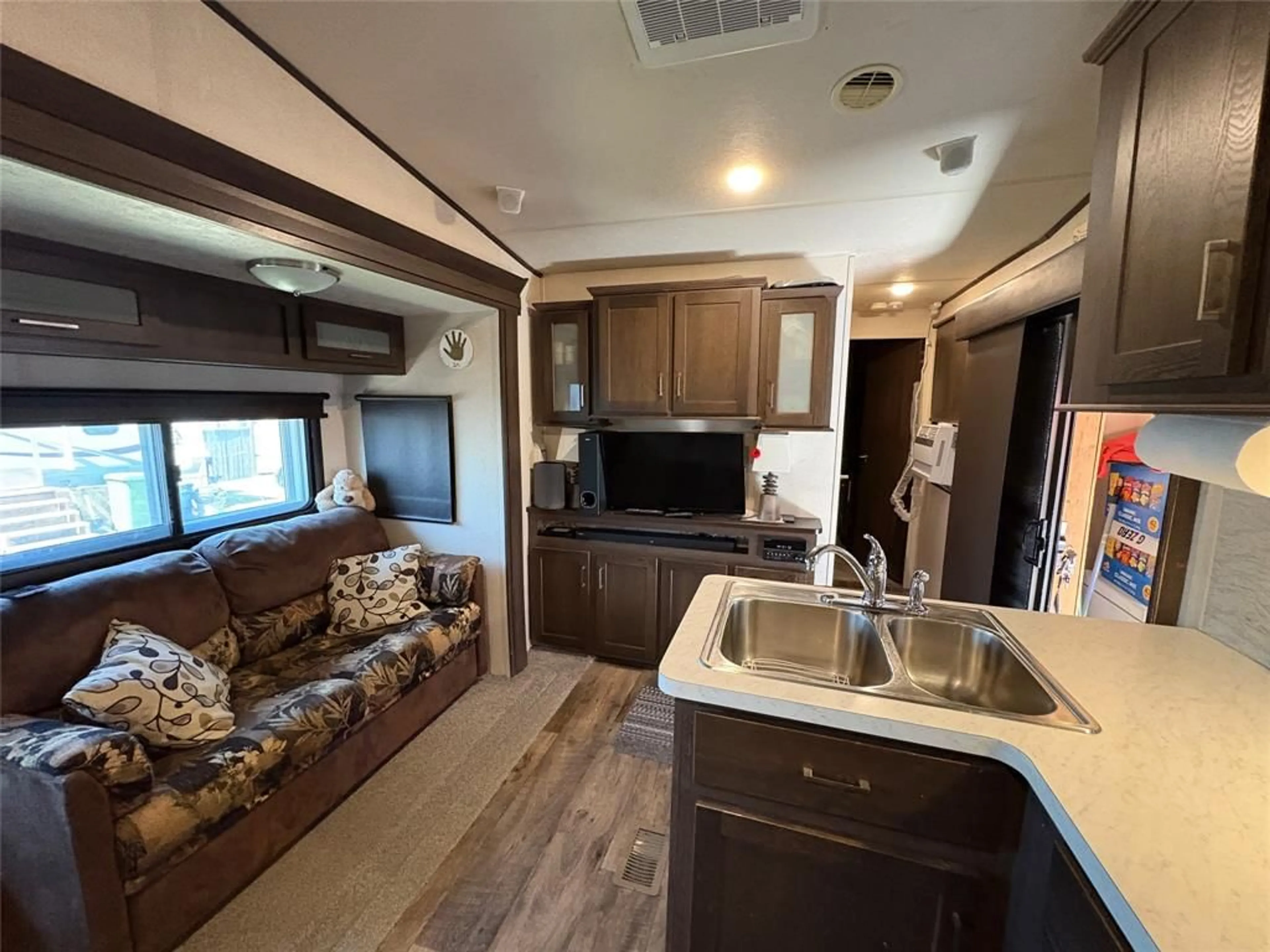 Open concept kitchen, wood/laminate floor for 4351 LONDON Line #1, Plympton-Wyoming Ontario N0N 1T0