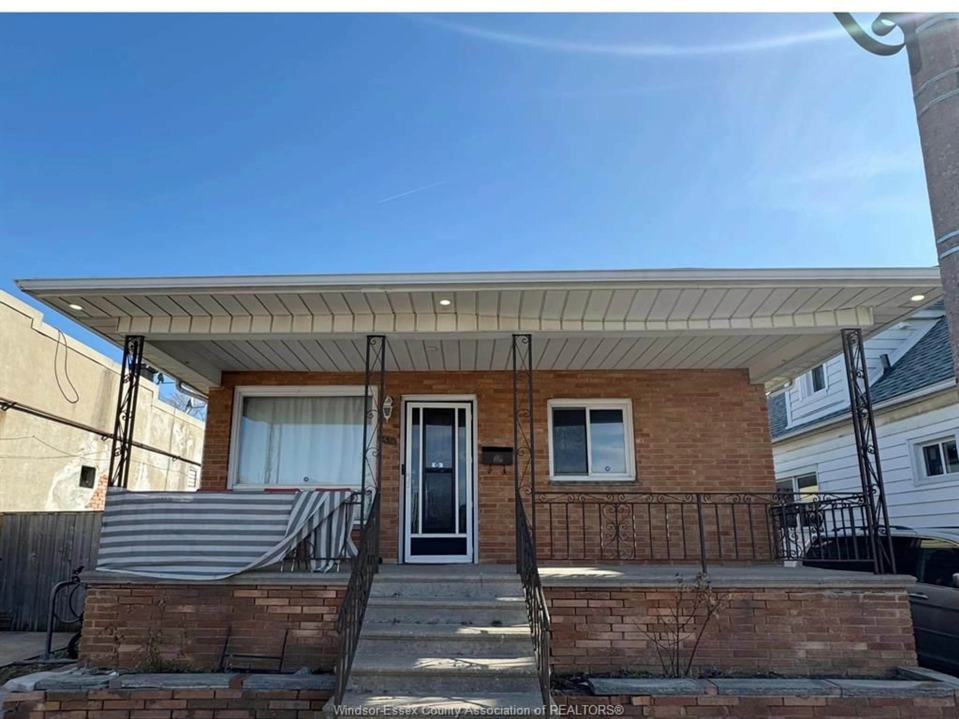 Home with brick exterior material, street for 1259 ERIE St, Windsor Ontario N9A 3Z6