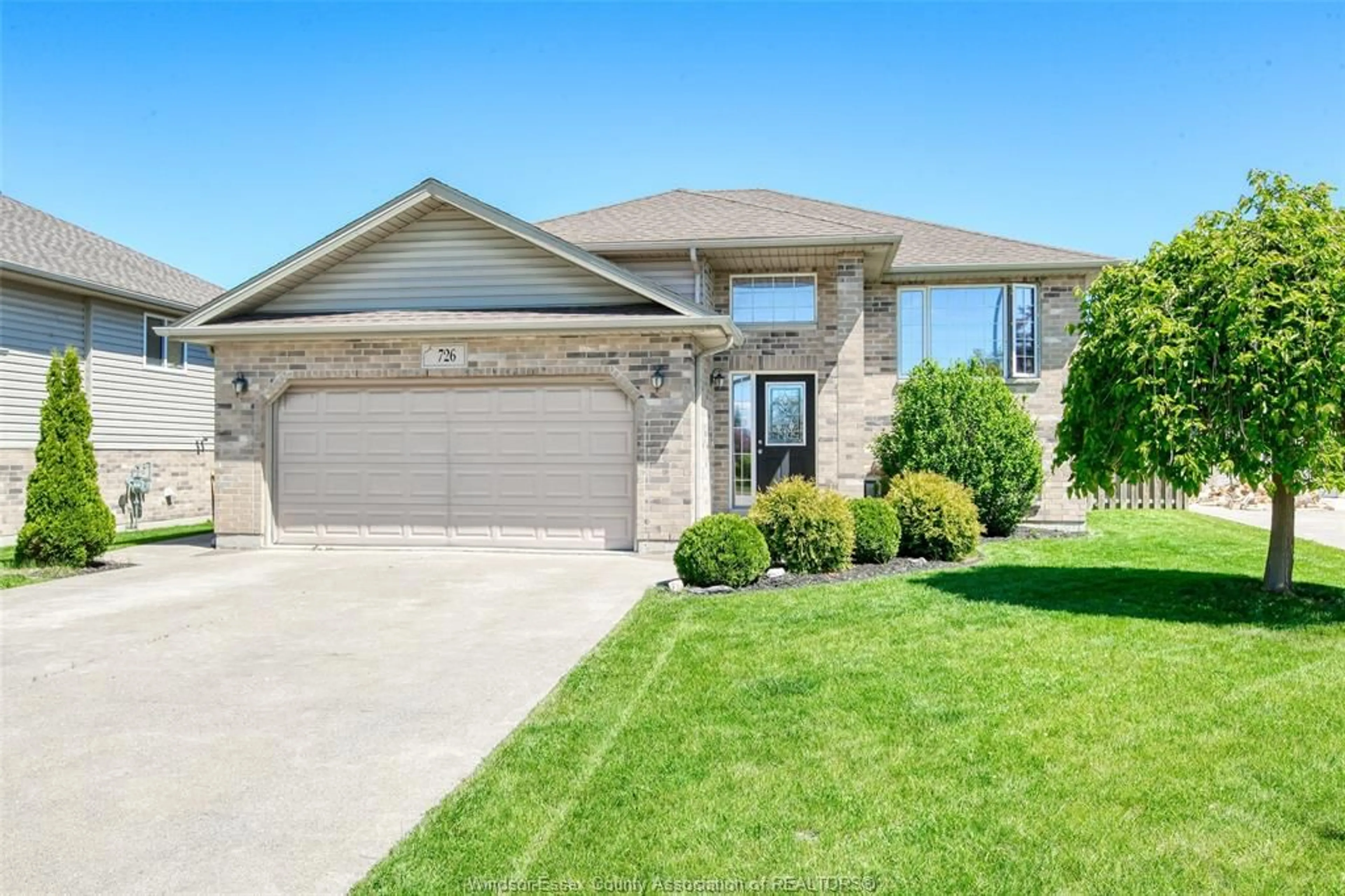 Home with brick exterior material, street for 726 HELENA Cres, Belle River Ontario N0R 1A0