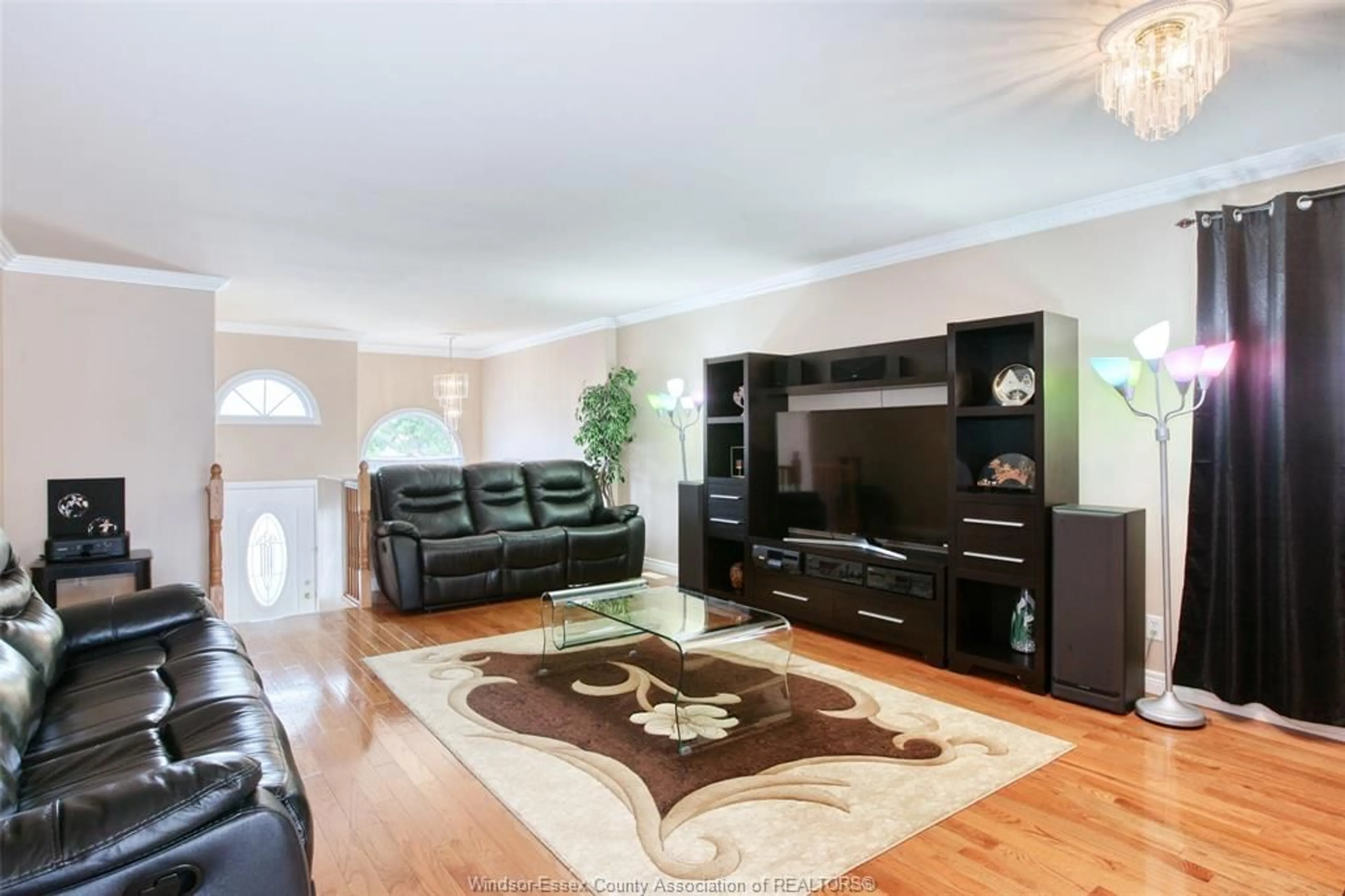 Living room with furniture, wood/laminate floor for 2387 Timbercrest Ave, Windsor Ontario N8P 1S1
