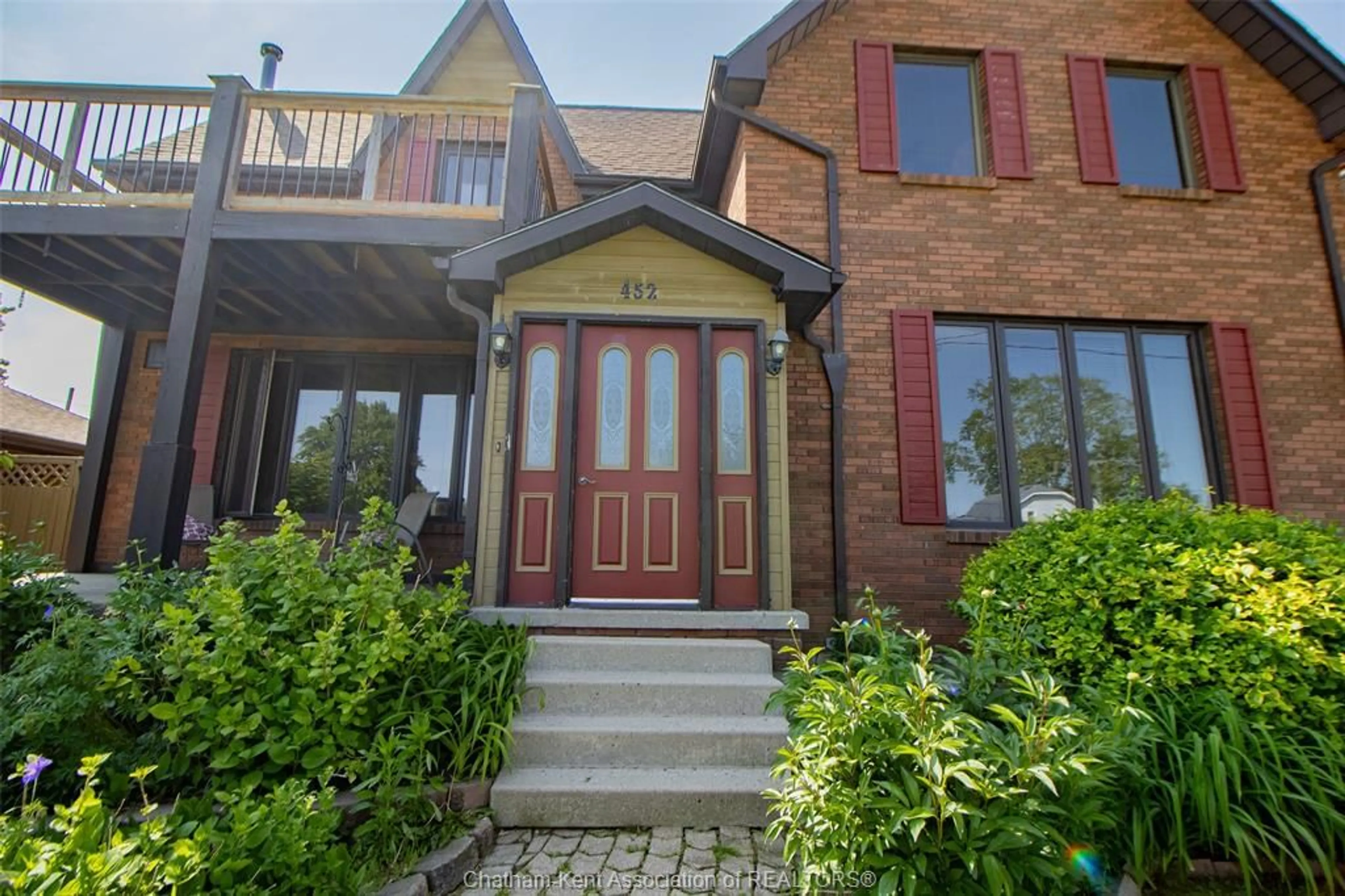 Home with brick exterior material, street for 452 Wallace St, Wallaceburg Ontario N8A 1L3