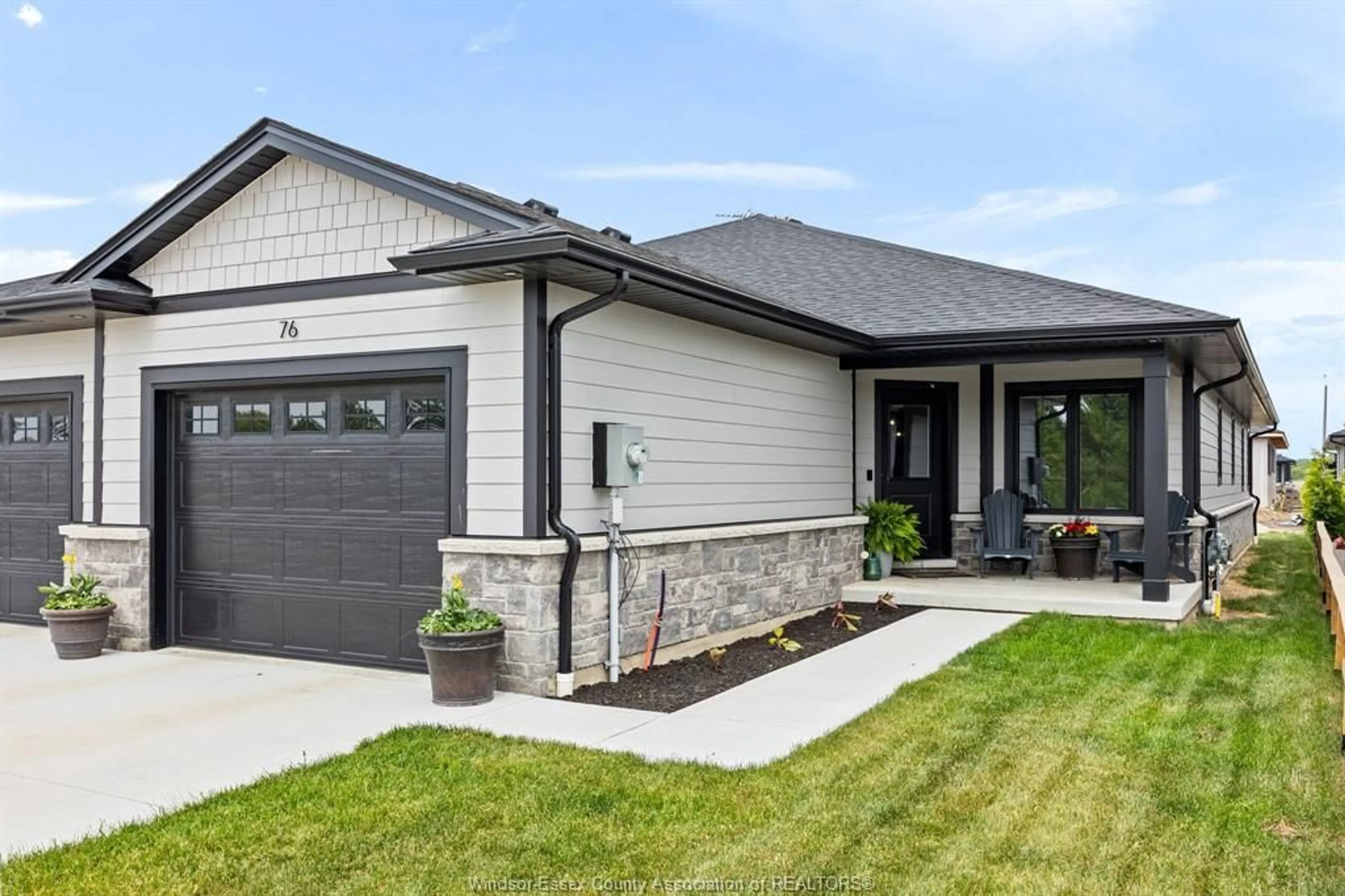 Home with brick exterior material, street for 76 MCKENZIE, Essex Ontario N0R 1G0