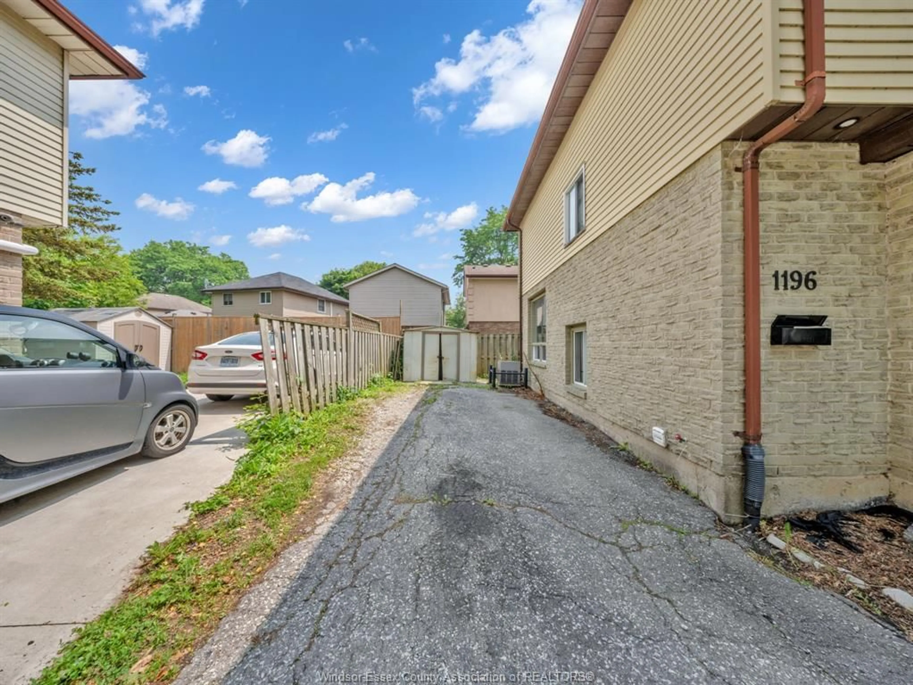 A pic from outside/outdoor area/front of a property/back of a property/a pic from drone, street for 1196 HEATHFIELD, Windsor Ontario N8S 4N9