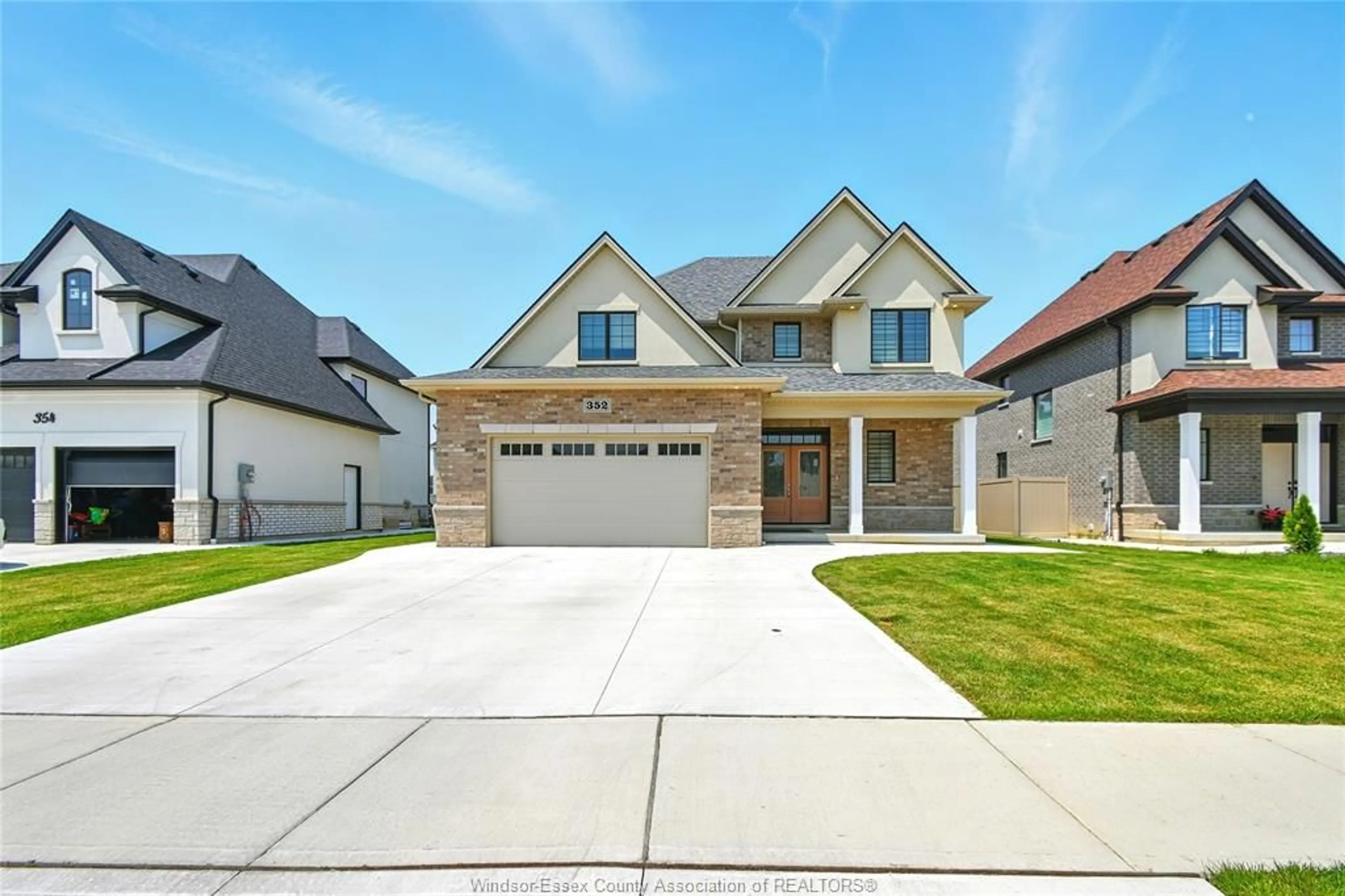 Home with brick exterior material, street for 352 CHRISTINE Ave, Belle River Ontario N8L 1B6
