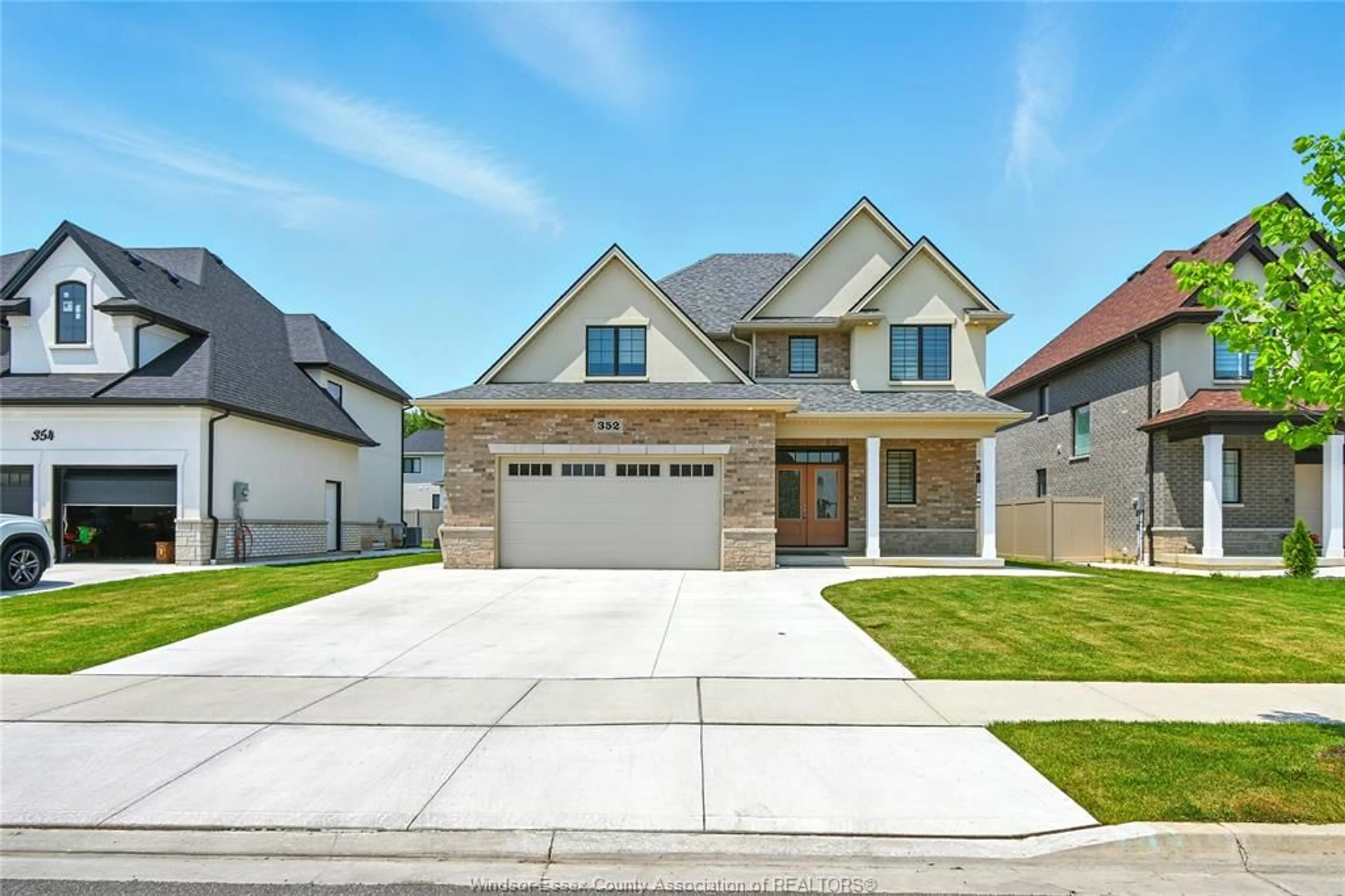 Home with brick exterior material, street for 352 CHRISTINE Ave, Belle River Ontario N8L 1B6