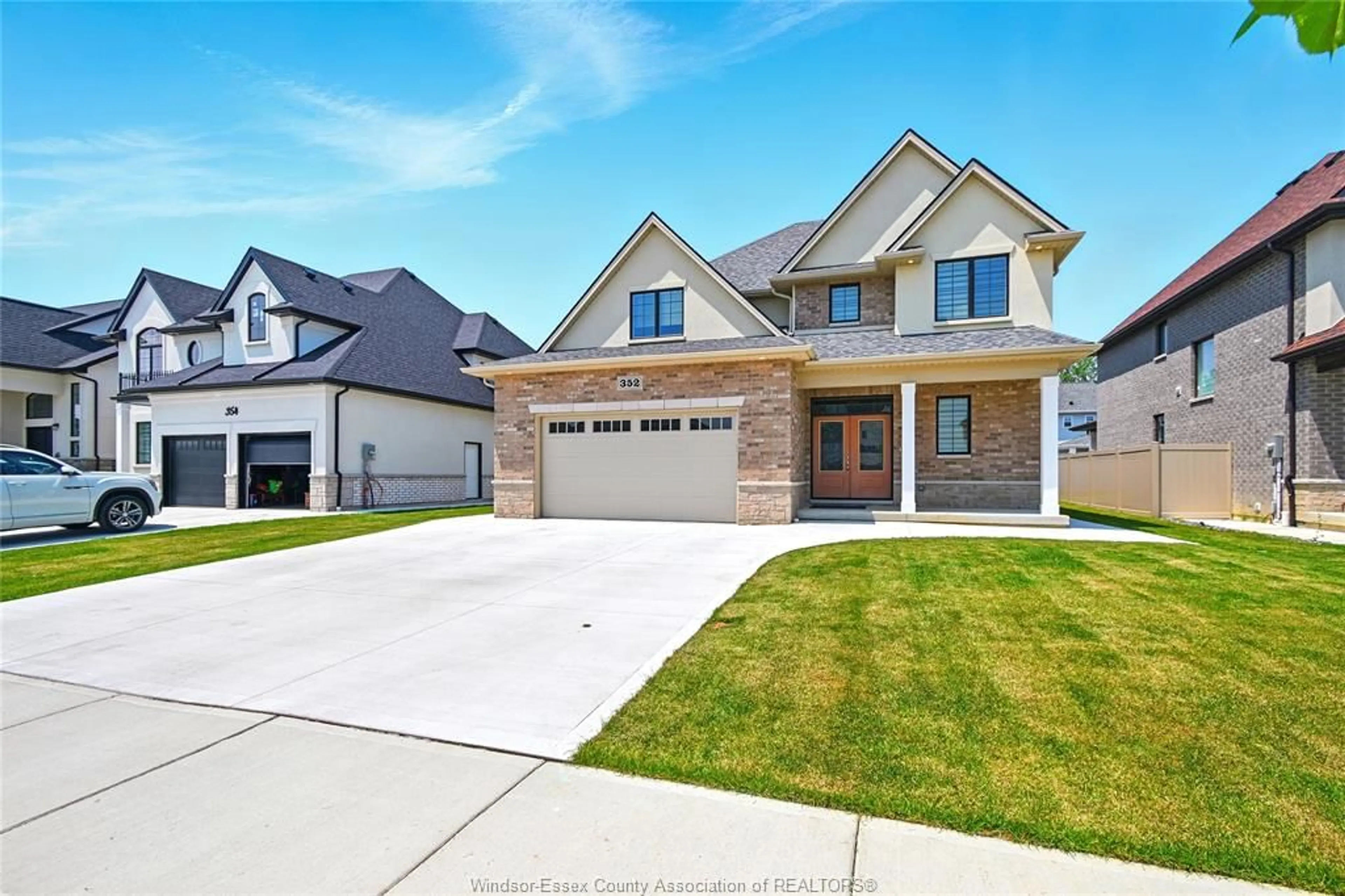 Home with brick exterior material, street for 352 CHRISTINE Ave, Belle River Ontario N8L 1B6