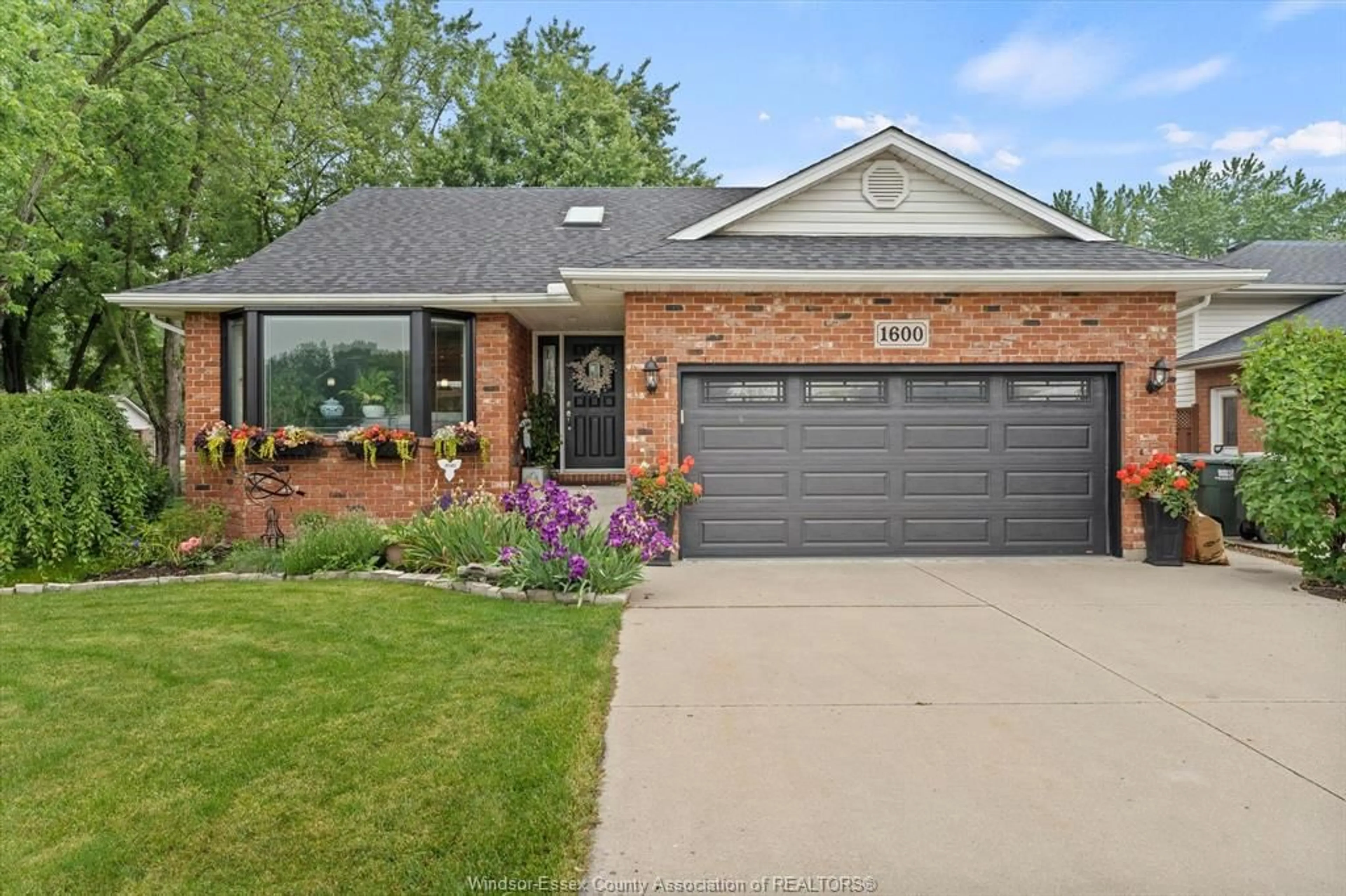 Home with brick exterior material, street for 1600 MAPLE Ave, LaSalle Ontario N9J 3L2