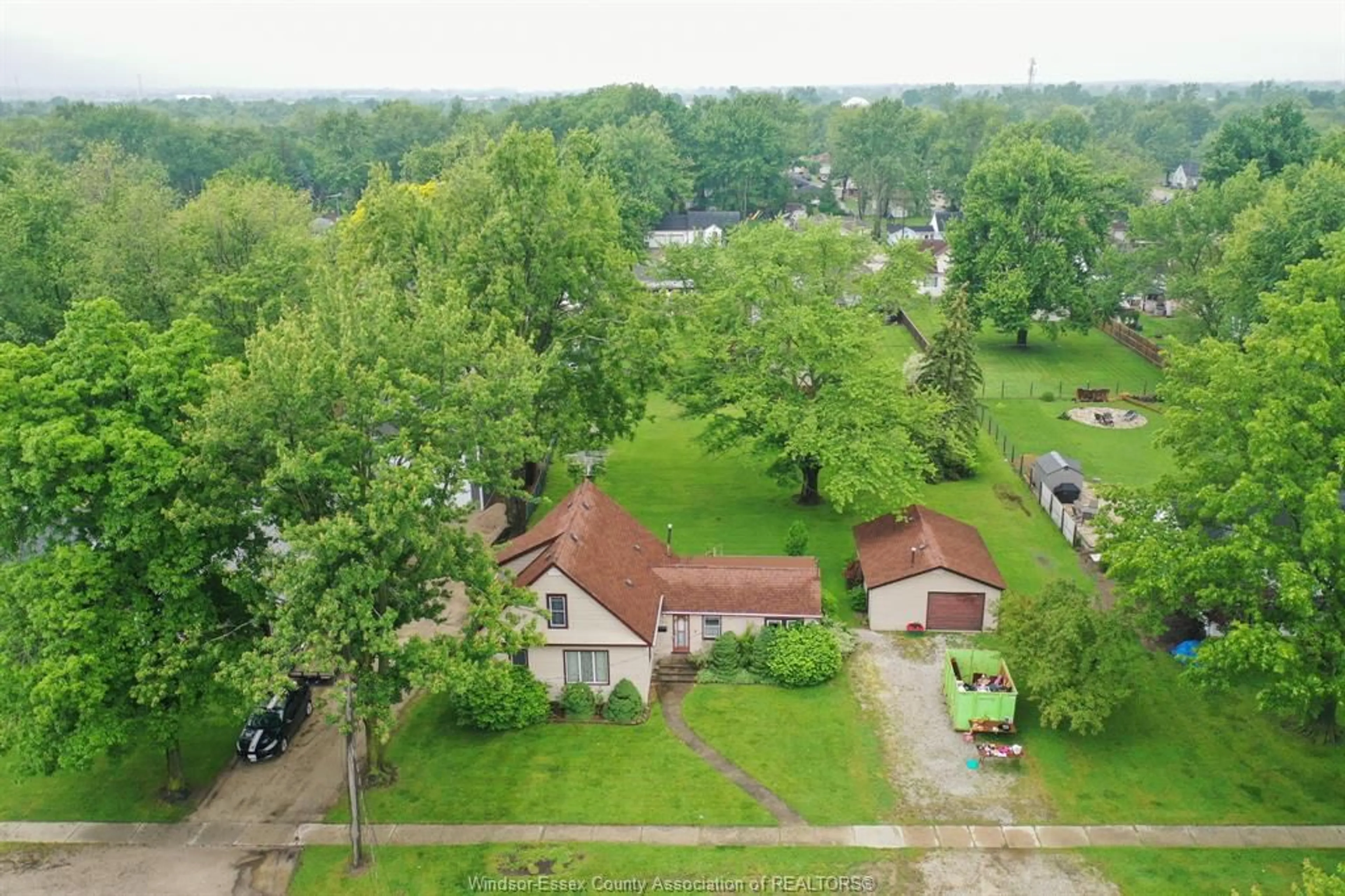 A pic from outside/outdoor area/front of a property/back of a property/a pic from drone, street for 207 Laird Ave, Essex Ontario N8M 1S6