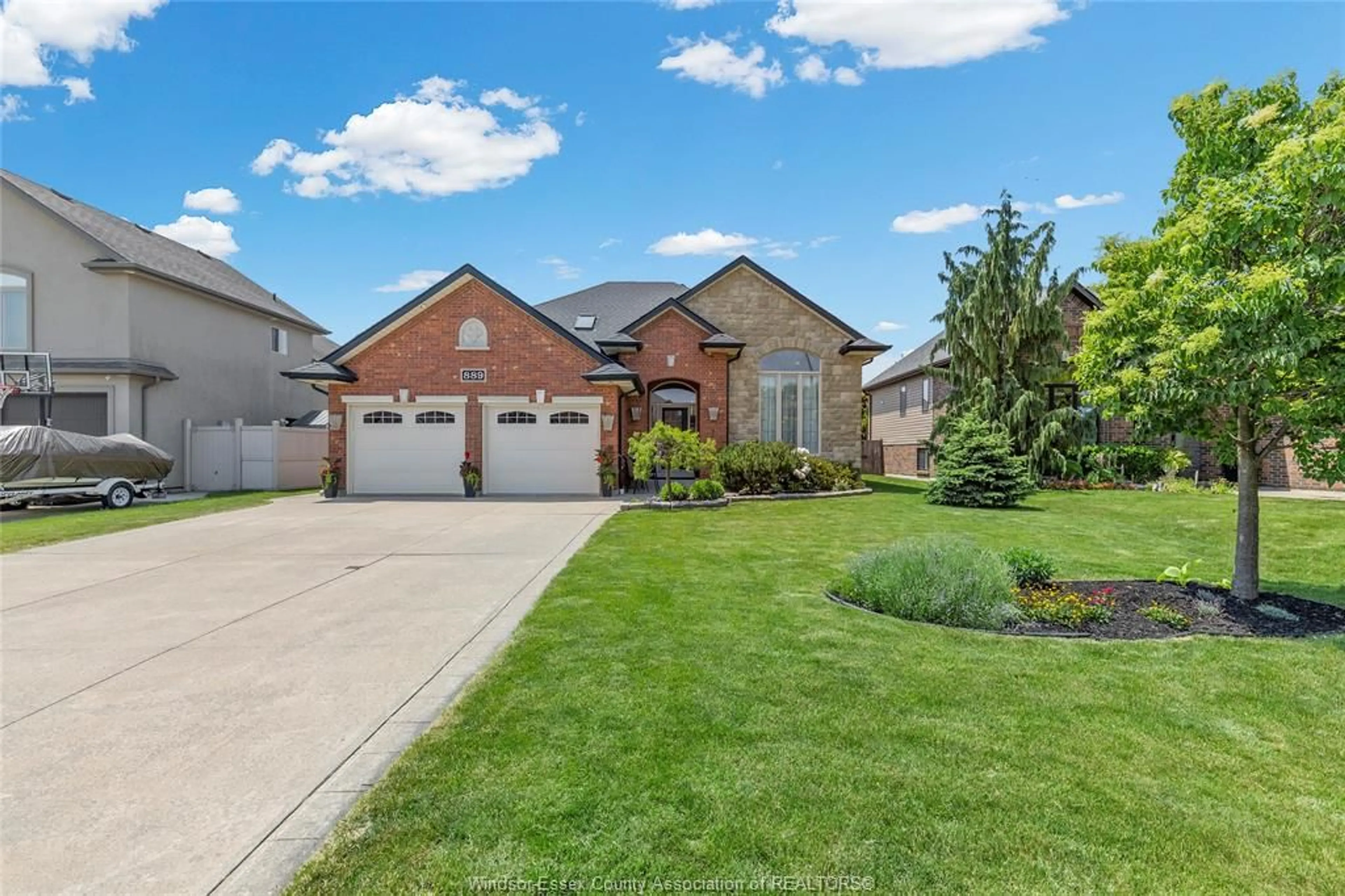Home with brick exterior material, street for 889 DRIFTWOOD, Lakeshore Ontario N8L 1G4