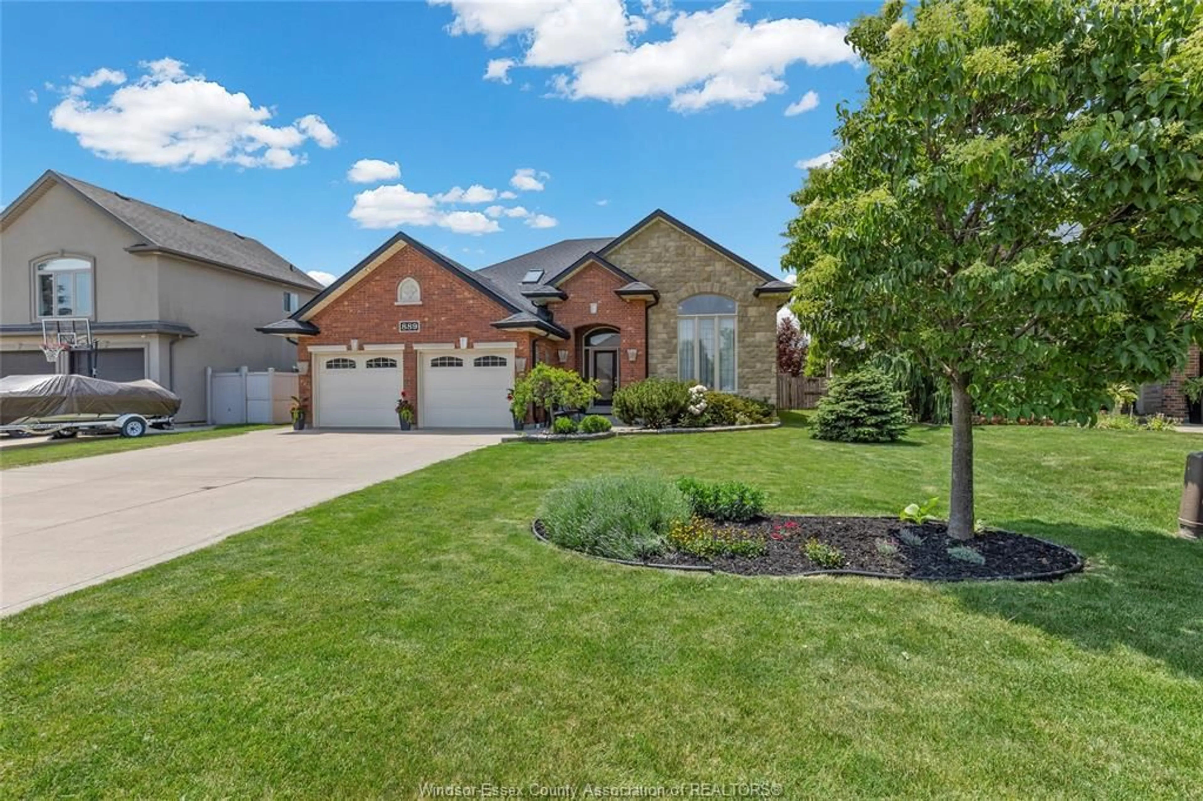 Home with brick exterior material, street for 889 DRIFTWOOD, Lakeshore Ontario N8L 1G4