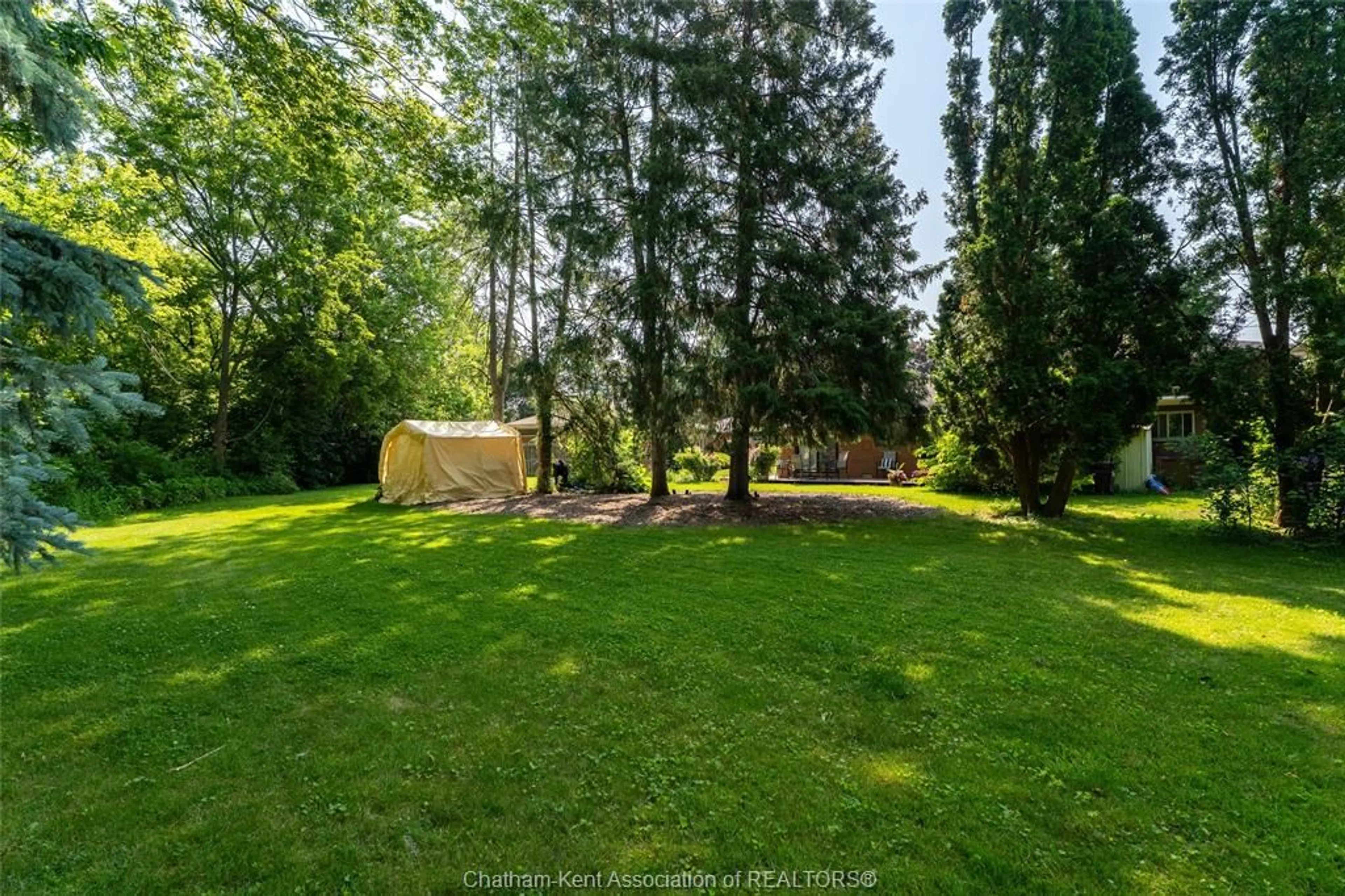 A pic from outside/outdoor area/front of a property/back of a property/a pic from drone, forest/trees view for 71 ARDLEIGH Dr, Chatham Ontario N7L 2P5
