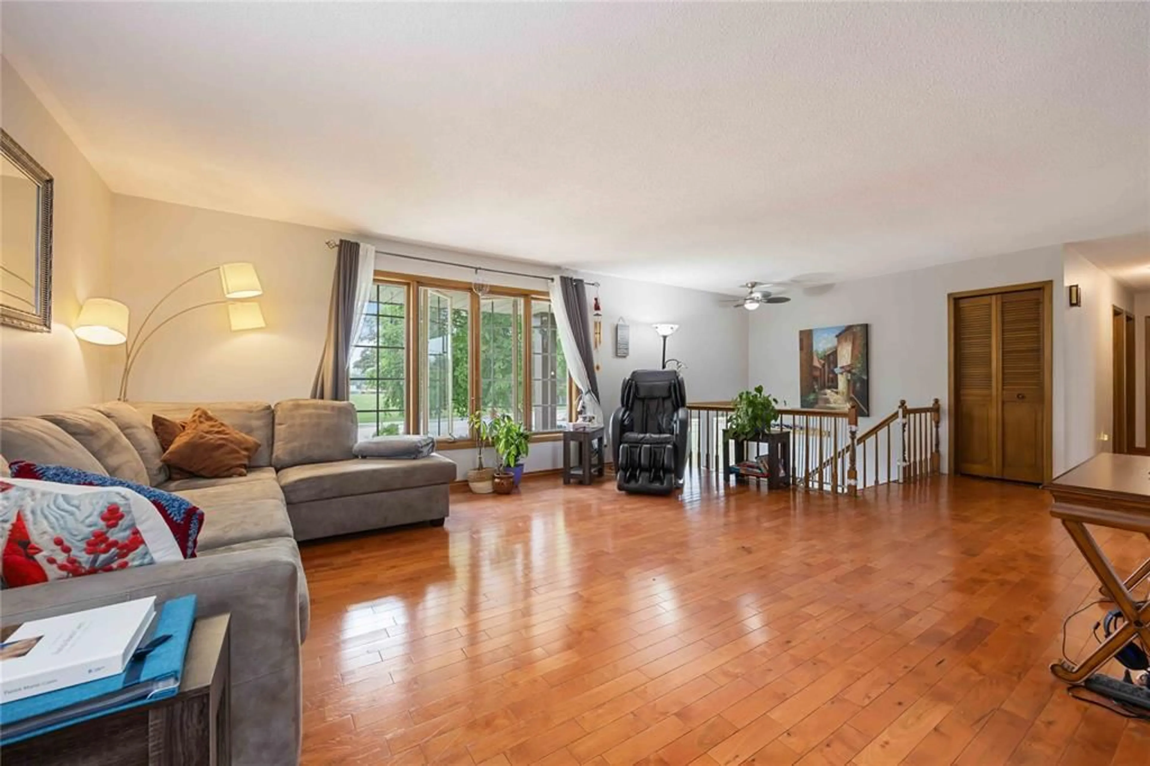Living room with furniture, wood/laminate floor for 1236 MICHIGAN Ave, Sarnia Ontario N7S 3Y2