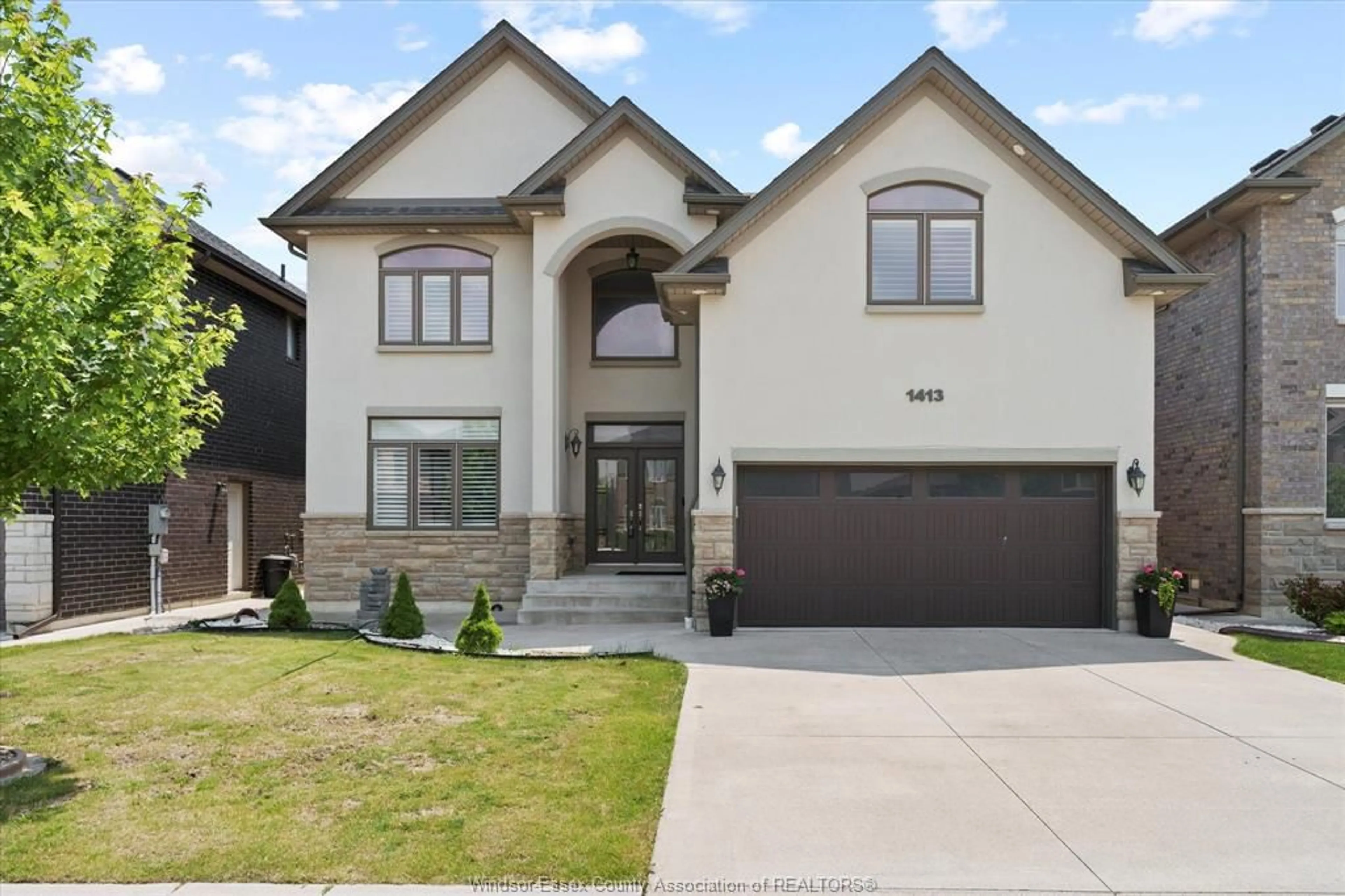 Home with brick exterior material, street for 1413 HELSINKI Crt, Windsor Ontario N9G 0B4