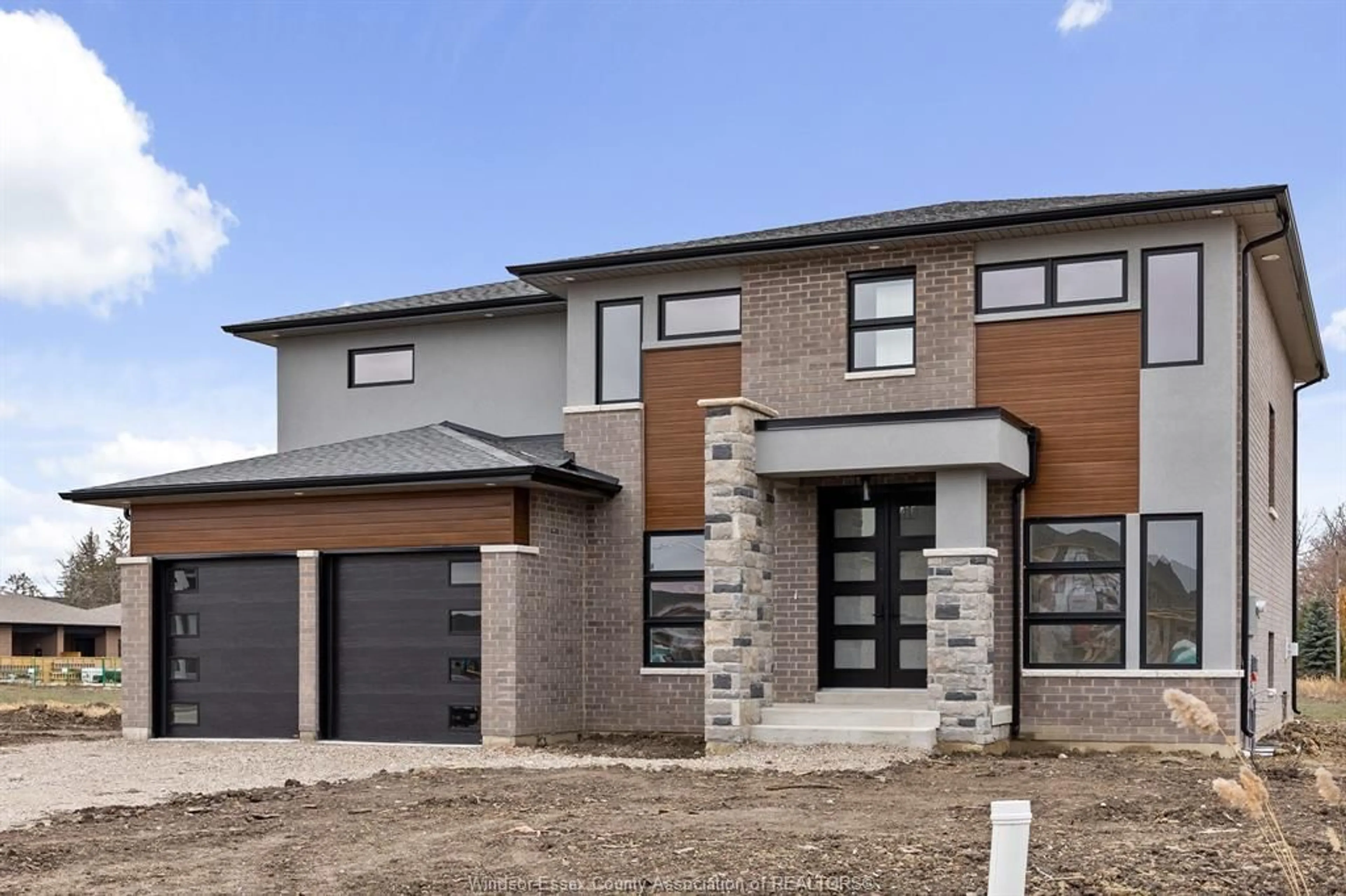 Home with brick exterior material, street for 1257 CAMPANA Cres, Lakeshore Ontario N8L 0K3