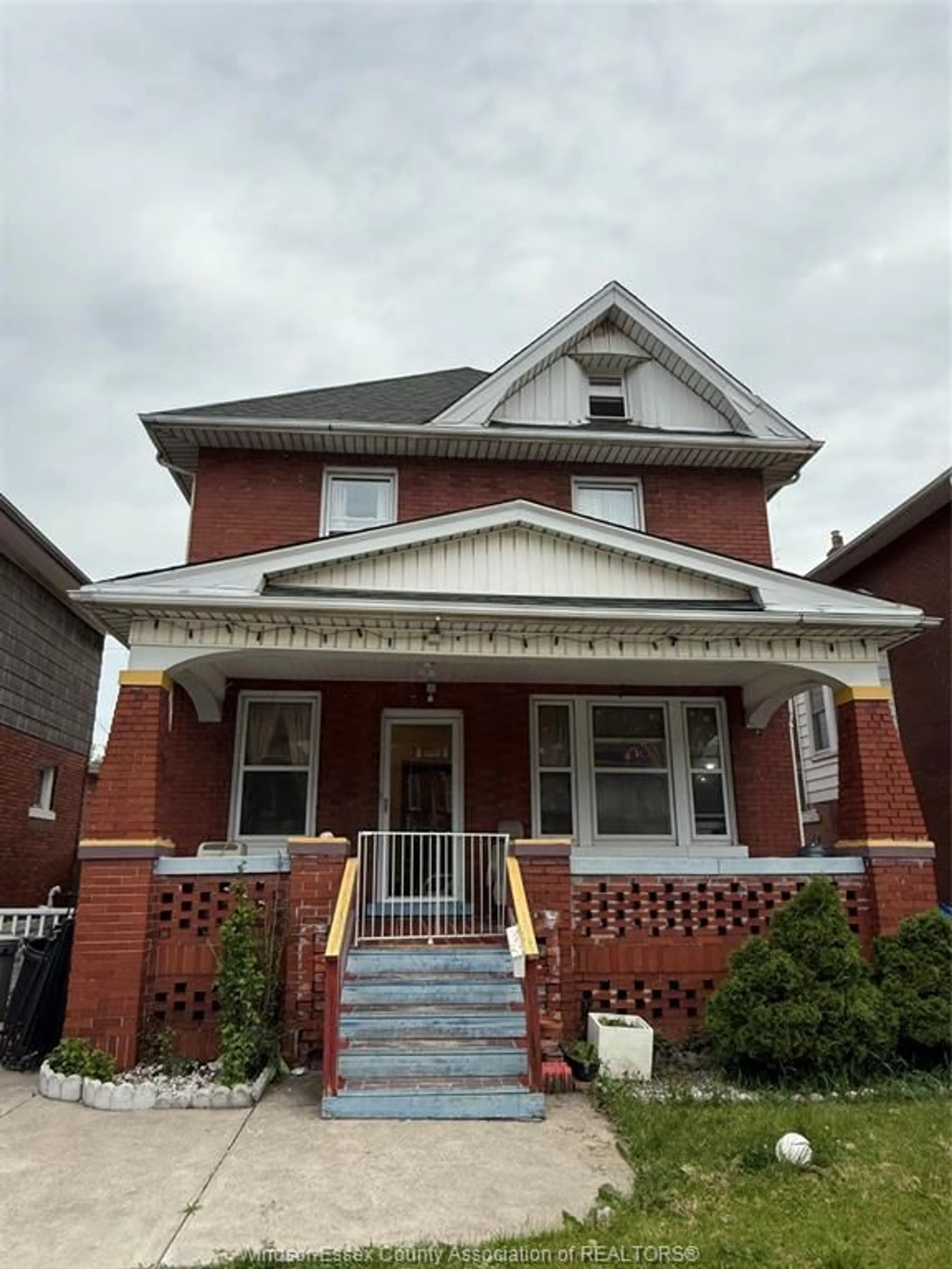 Home with brick exterior material, street for 914 DOUGALL Ave, Windsor Ontario N9A 4R1