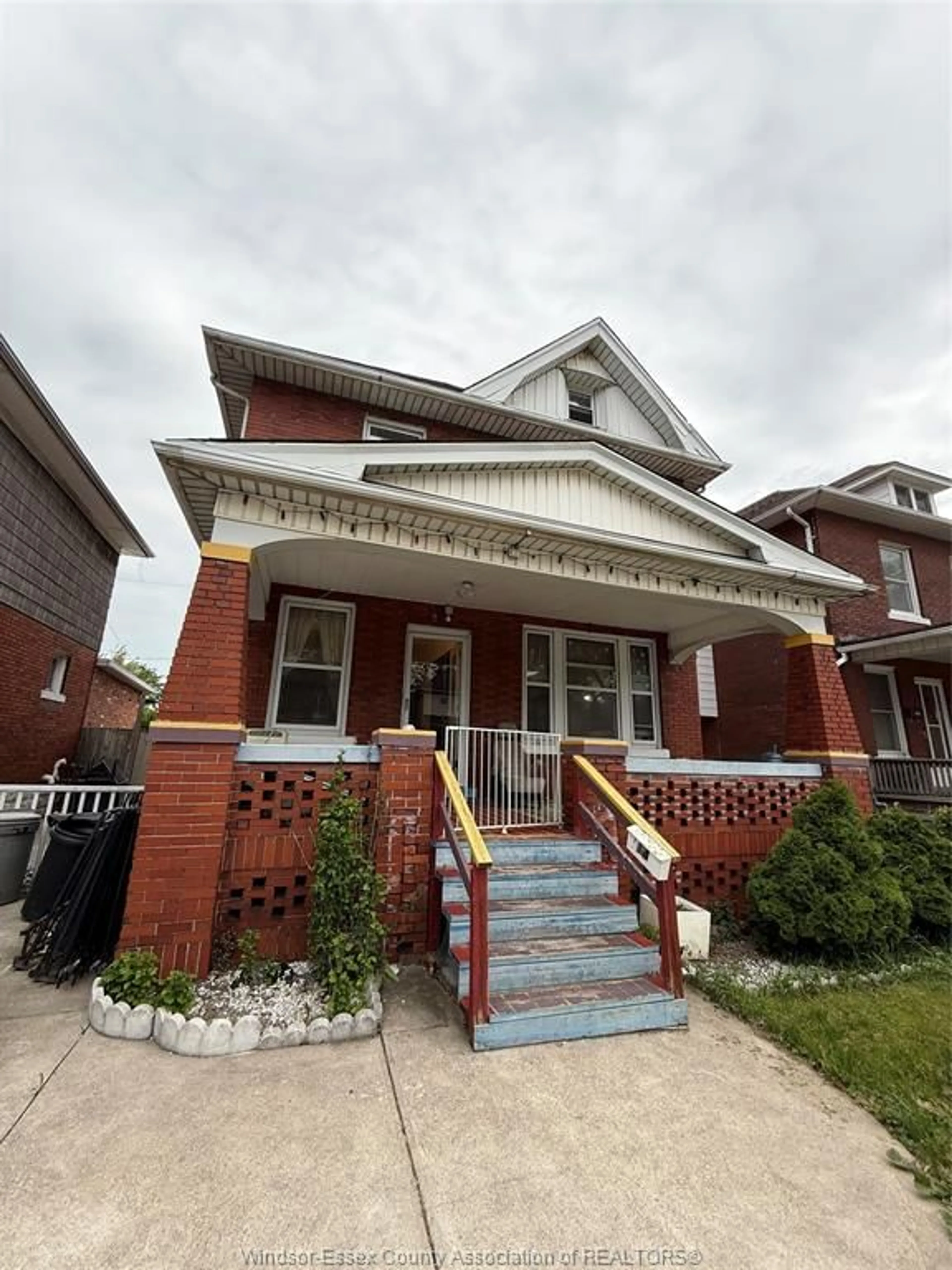 Home with brick exterior material, street for 914 DOUGALL Ave, Windsor Ontario N9A 4R1