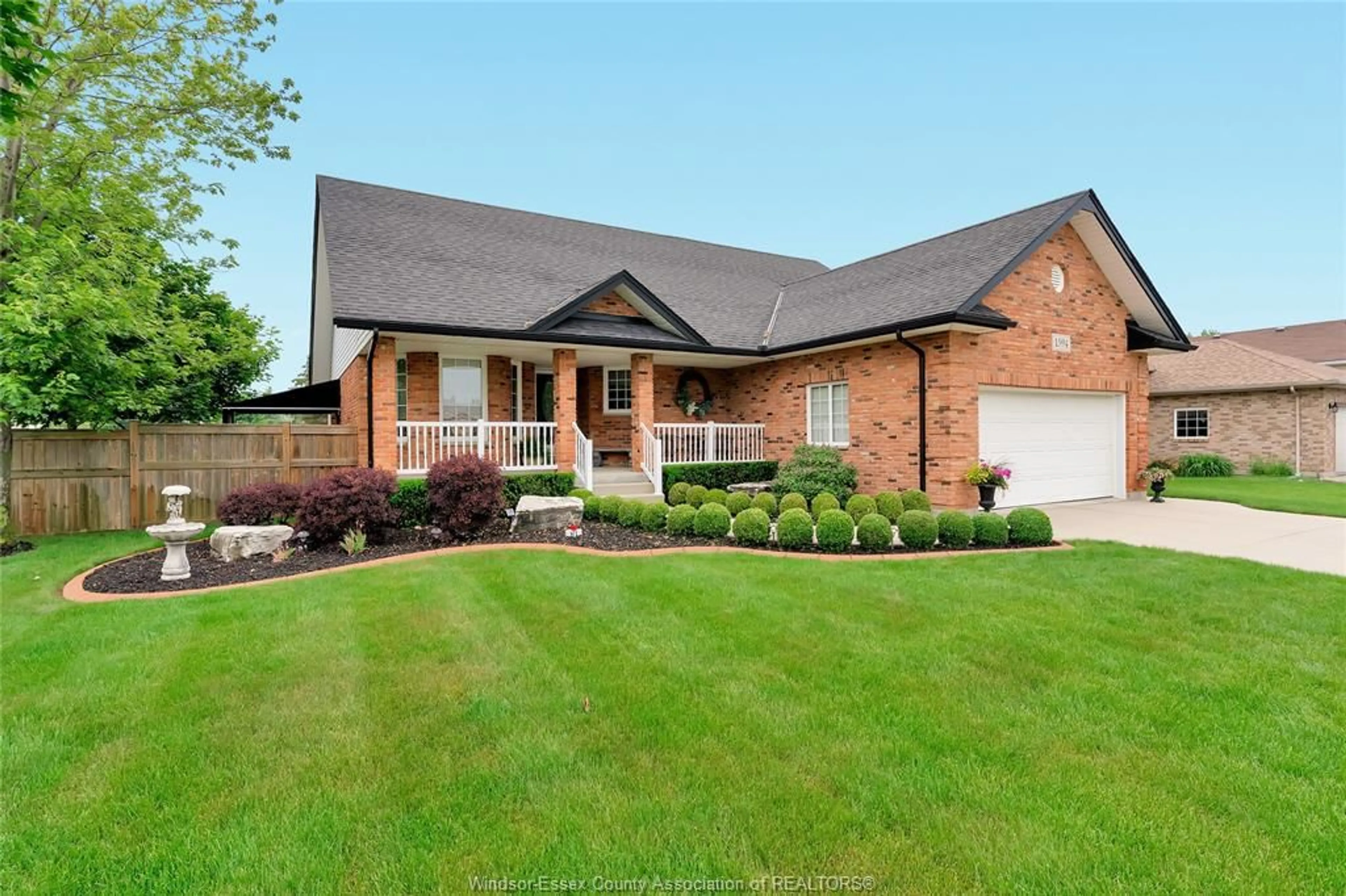 Home with brick exterior material, street for 1594 WHITEWOOD Dr, Lakeshore Ontario N0R 1A0