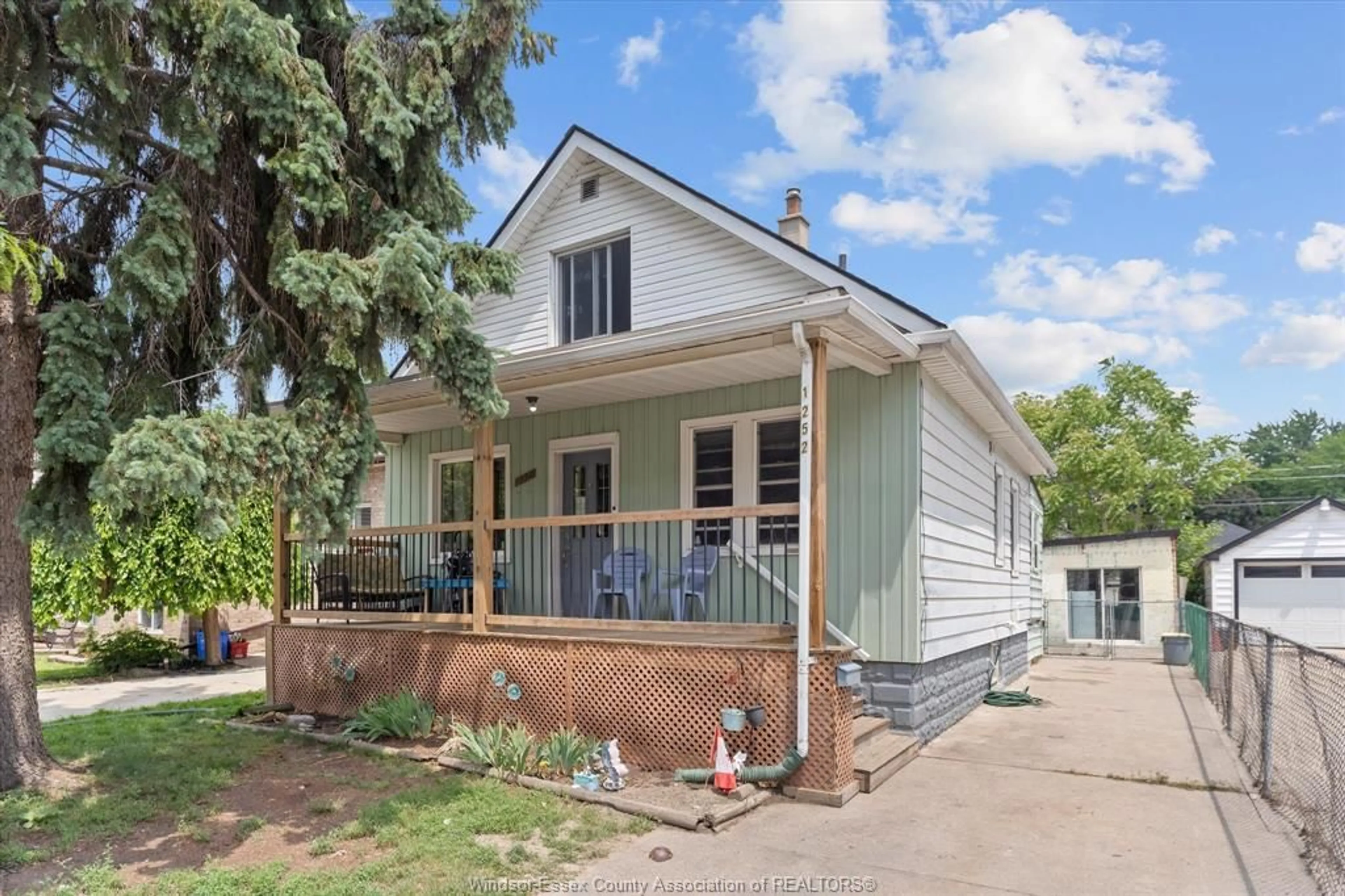Home with vinyl exterior material, street for 1252 ST. LUKE Rd, Windsor Ontario N8Y 3N1