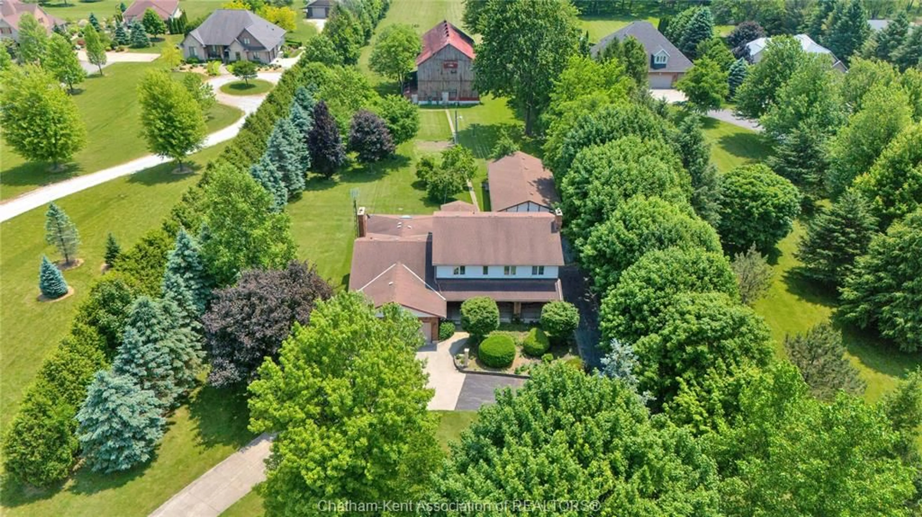 A pic from outside/outdoor area/front of a property/back of a property/a pic from drone, street for 7308 Grande River Line, Chatham Ontario N7M 0N3