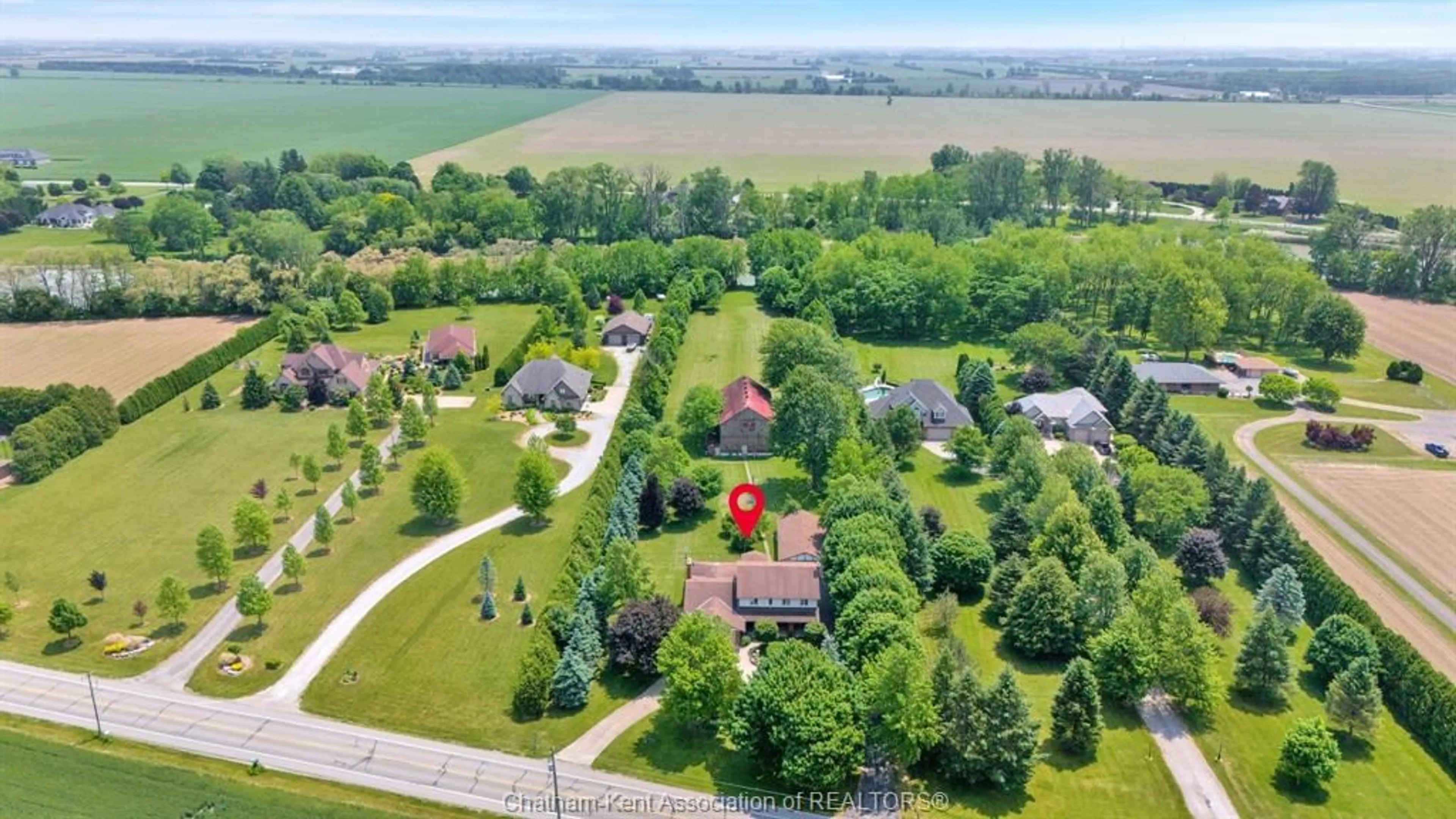 A pic from outside/outdoor area/front of a property/back of a property/a pic from drone, water/lake/river/ocean view for 7308 Grande River Line, Chatham Ontario N7M 0N3