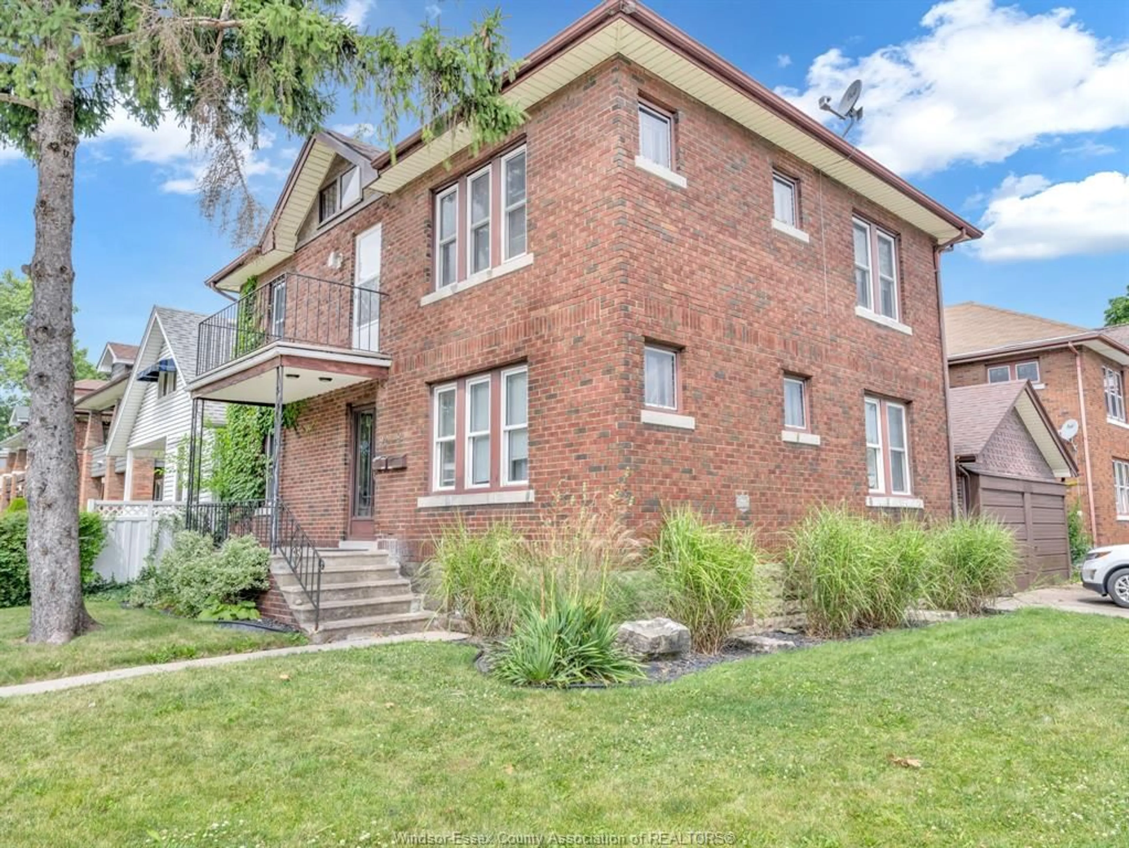Home with brick exterior material, street for 92-94 HANNA St, Windsor Ontario N8X 2M9