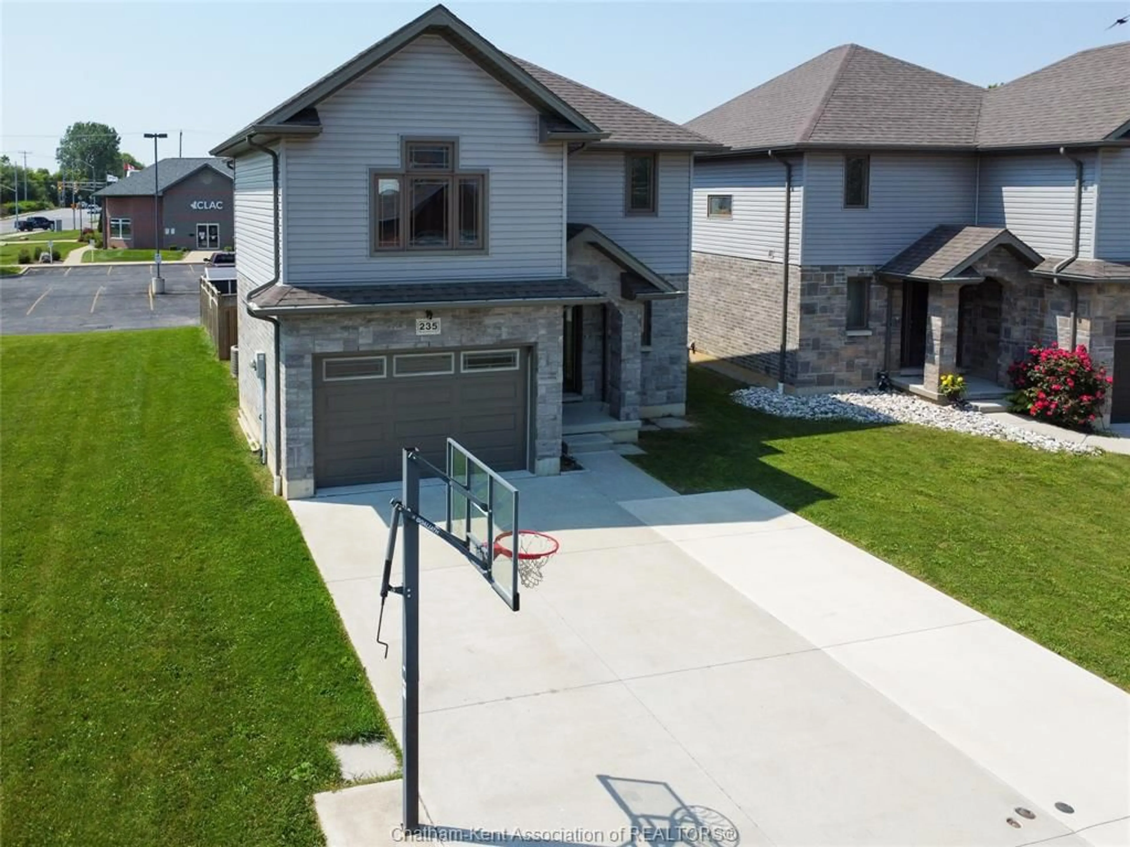 A pic from outside/outdoor area/front of a property/back of a property/a pic from drone, street for 235 Bristol Dr, Chatham Ontario N7M 6K9