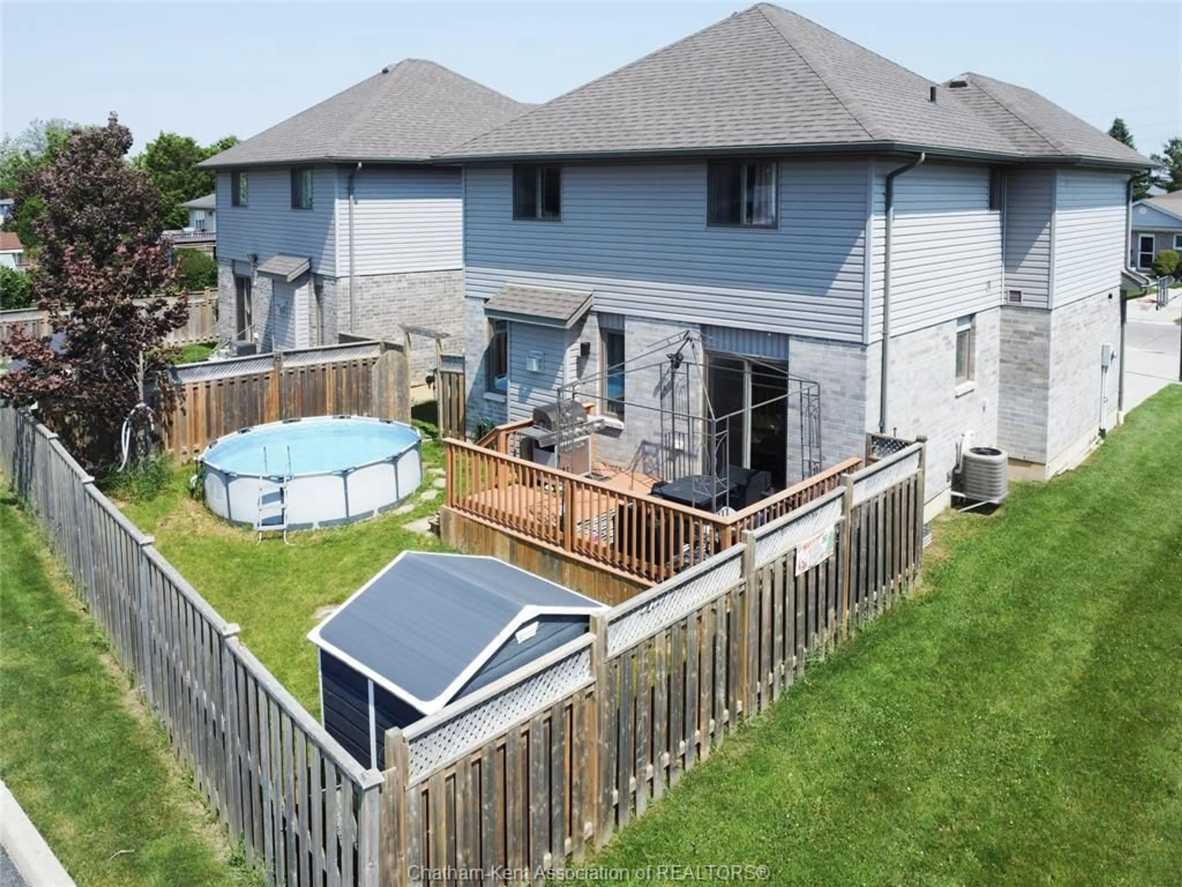 A pic from outside/outdoor area/front of a property/back of a property/a pic from drone, water/lake/river/ocean view for 235 Bristol Dr, Chatham Ontario N7M 6K9