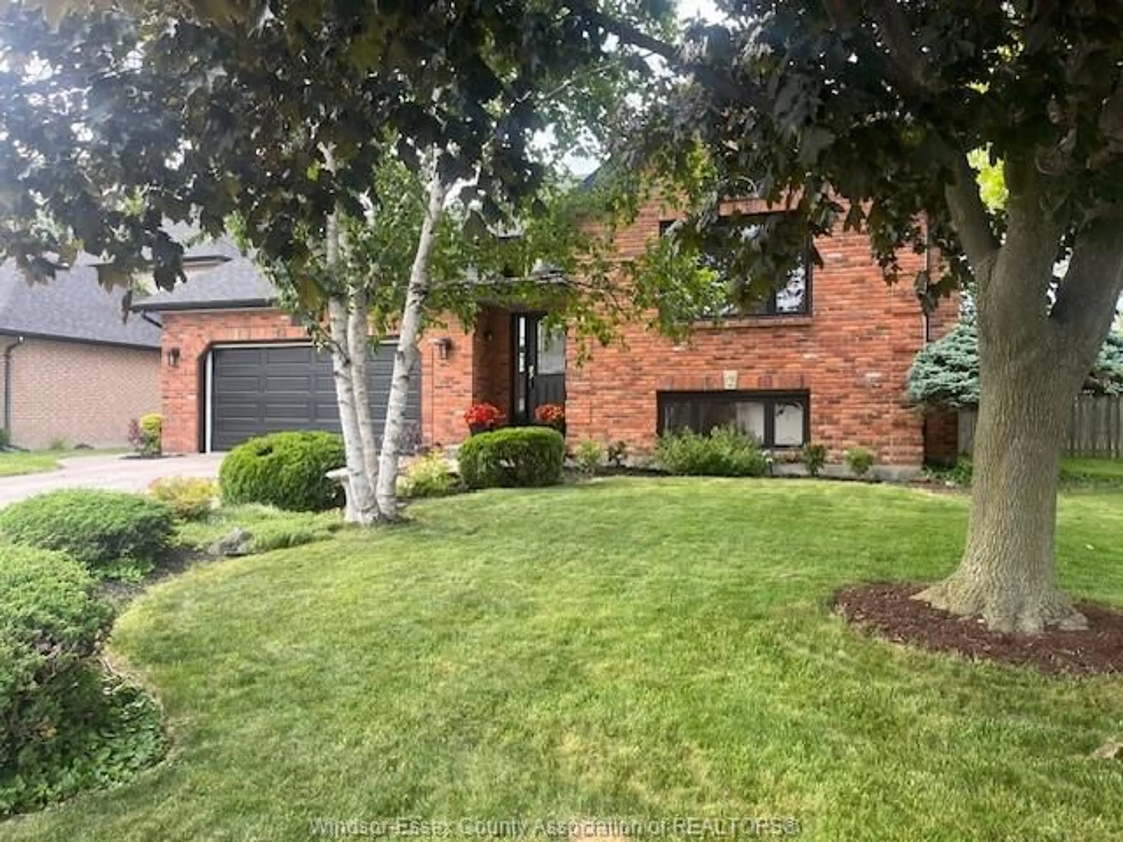 Home with brick exterior material, street for 12410 MEANDER Cres, Tecumseh Ontario N8N 4P3