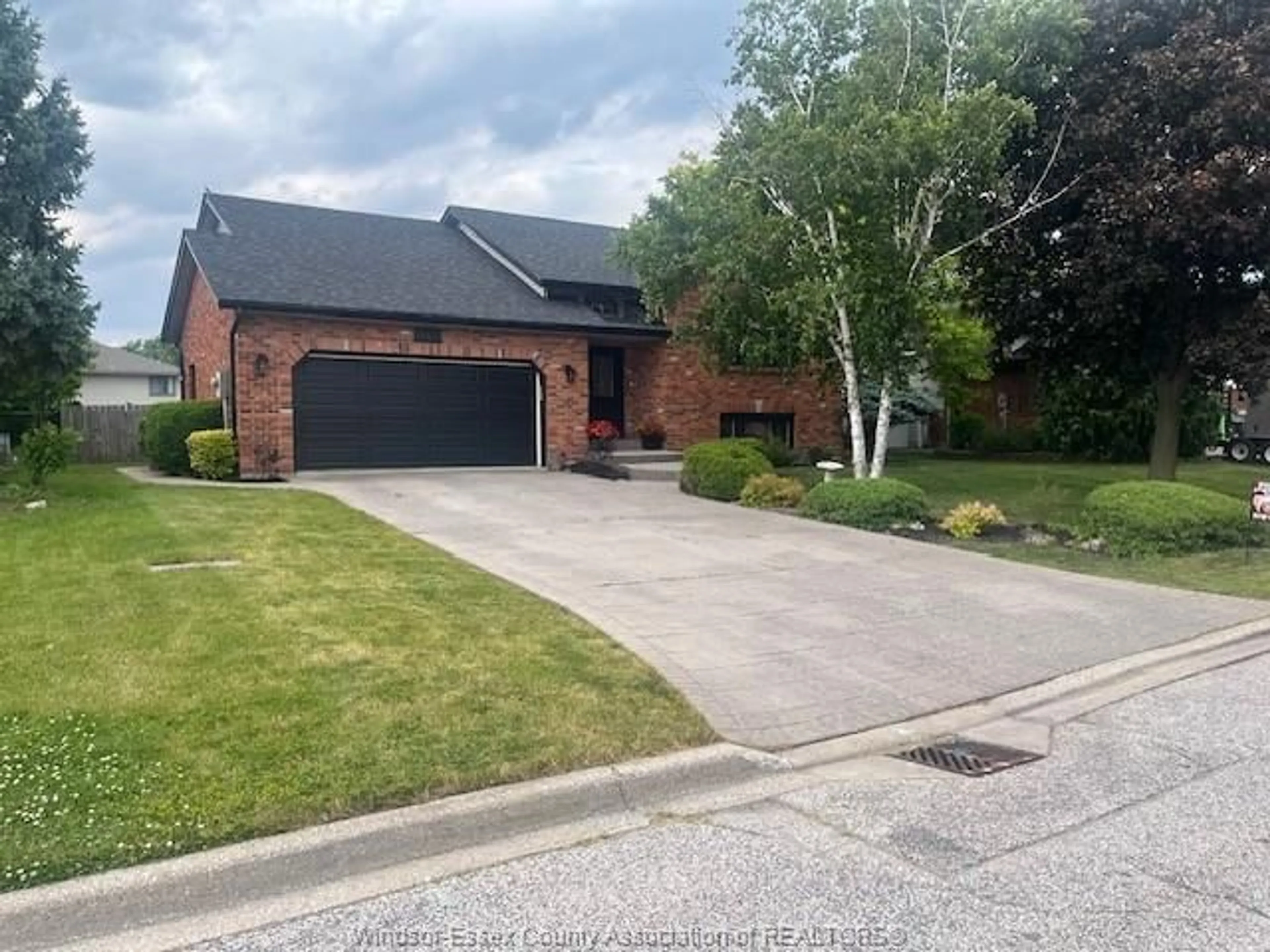 Home with brick exterior material, street for 12410 MEANDER Cres, Tecumseh Ontario N8N 4P3