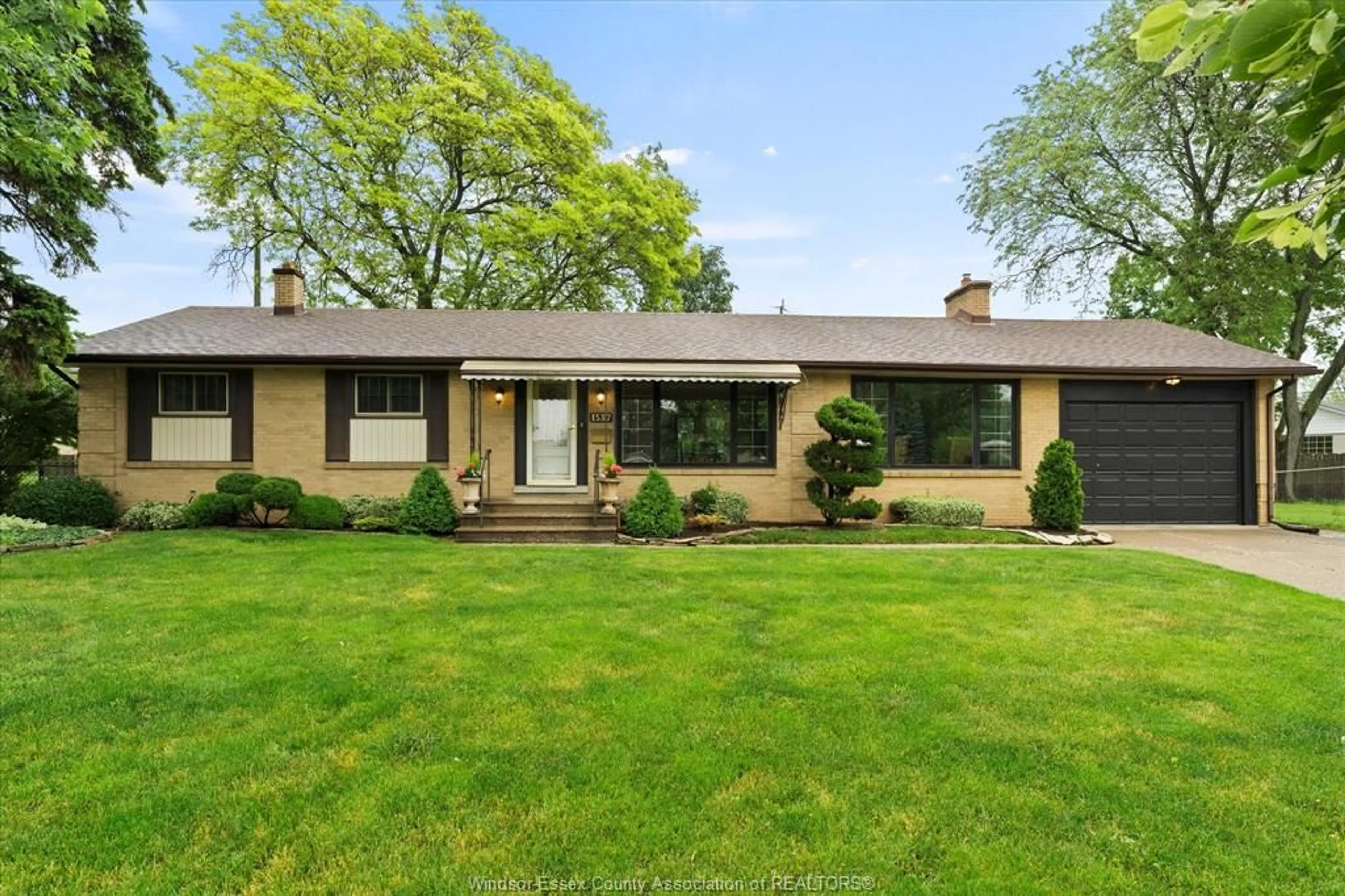 Home with brick exterior material, street for 1537 Cherrylawn Cres, Windsor Ontario N9E 1P3