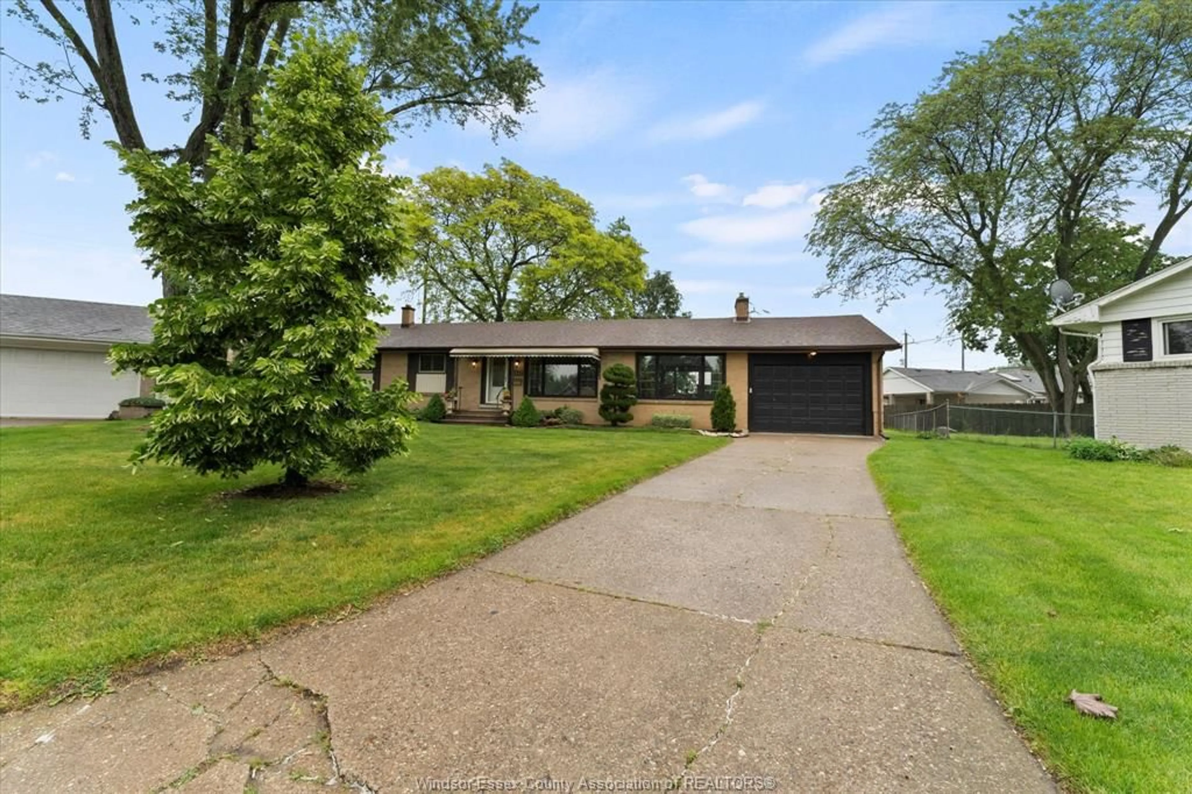 A pic from outside/outdoor area/front of a property/back of a property/a pic from drone, street for 1537 Cherrylawn Cres, Windsor Ontario N9E 1P3