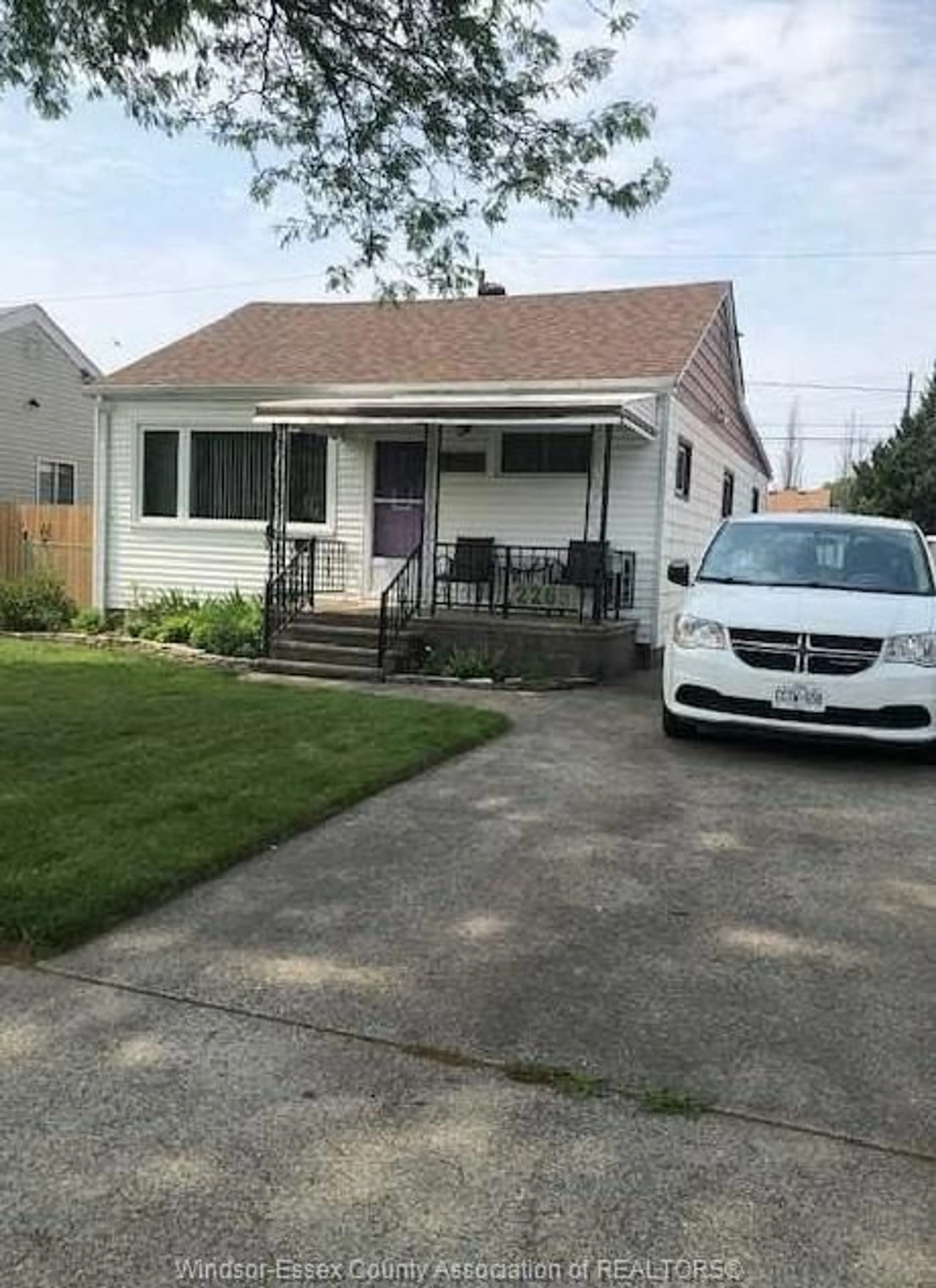 Home with vinyl exterior material, street for 2265 FOREST Ave, Windsor Ontario N8W 4C2