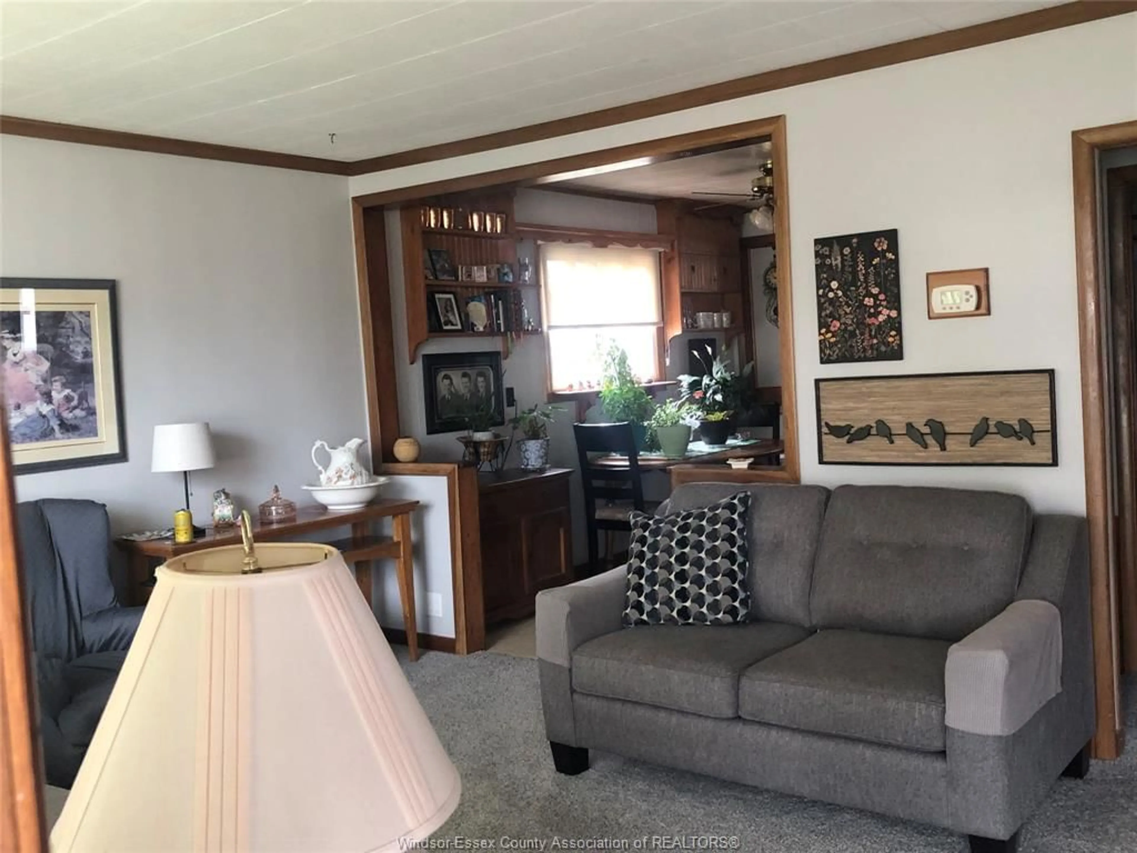 Living room with furniture, wood/laminate floor for 2265 FOREST Ave, Windsor Ontario N8W 2G7