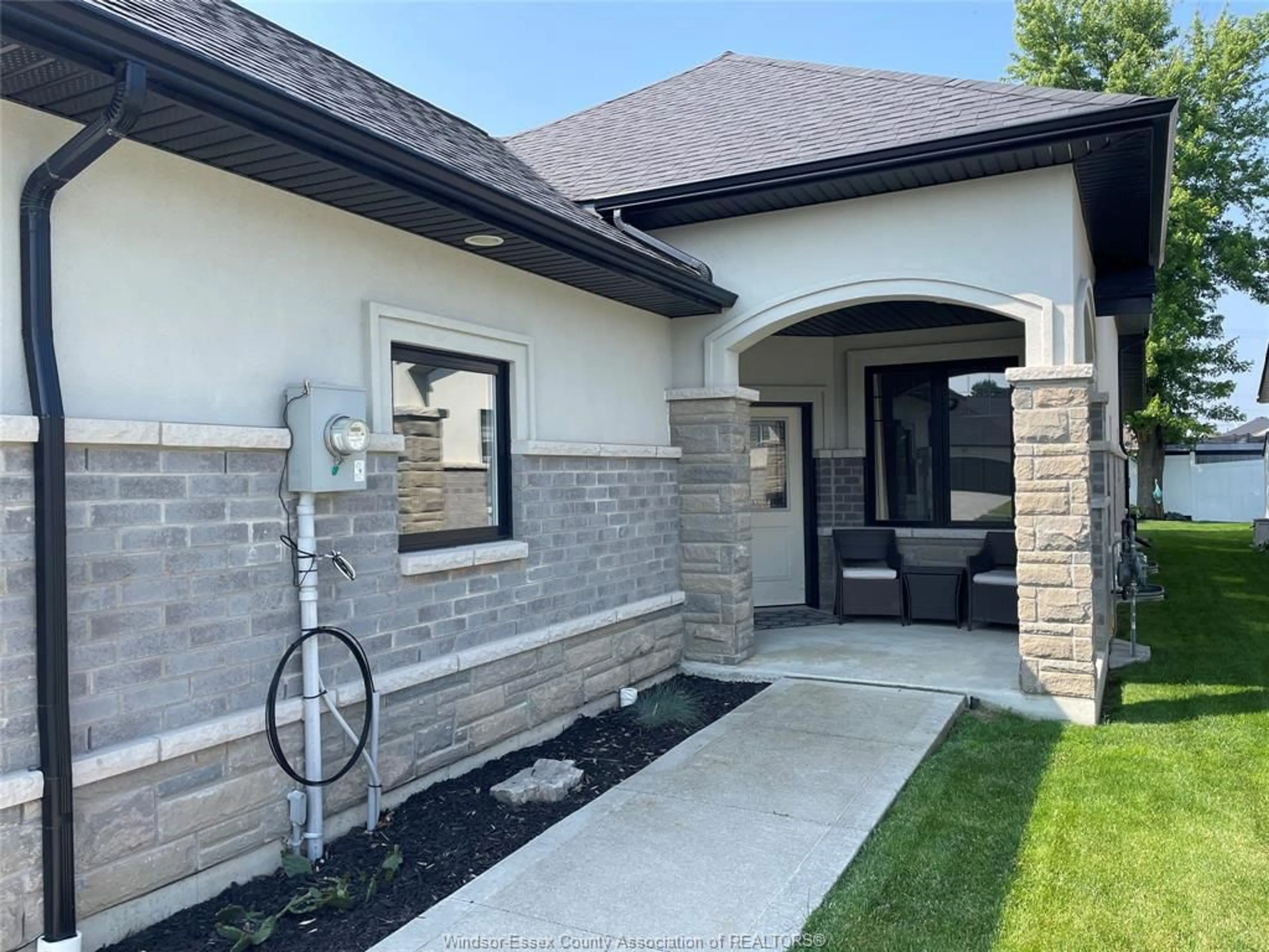 Home with brick exterior material, street for 94 HOUGHTON St, Essex Ontario N8M 0A5