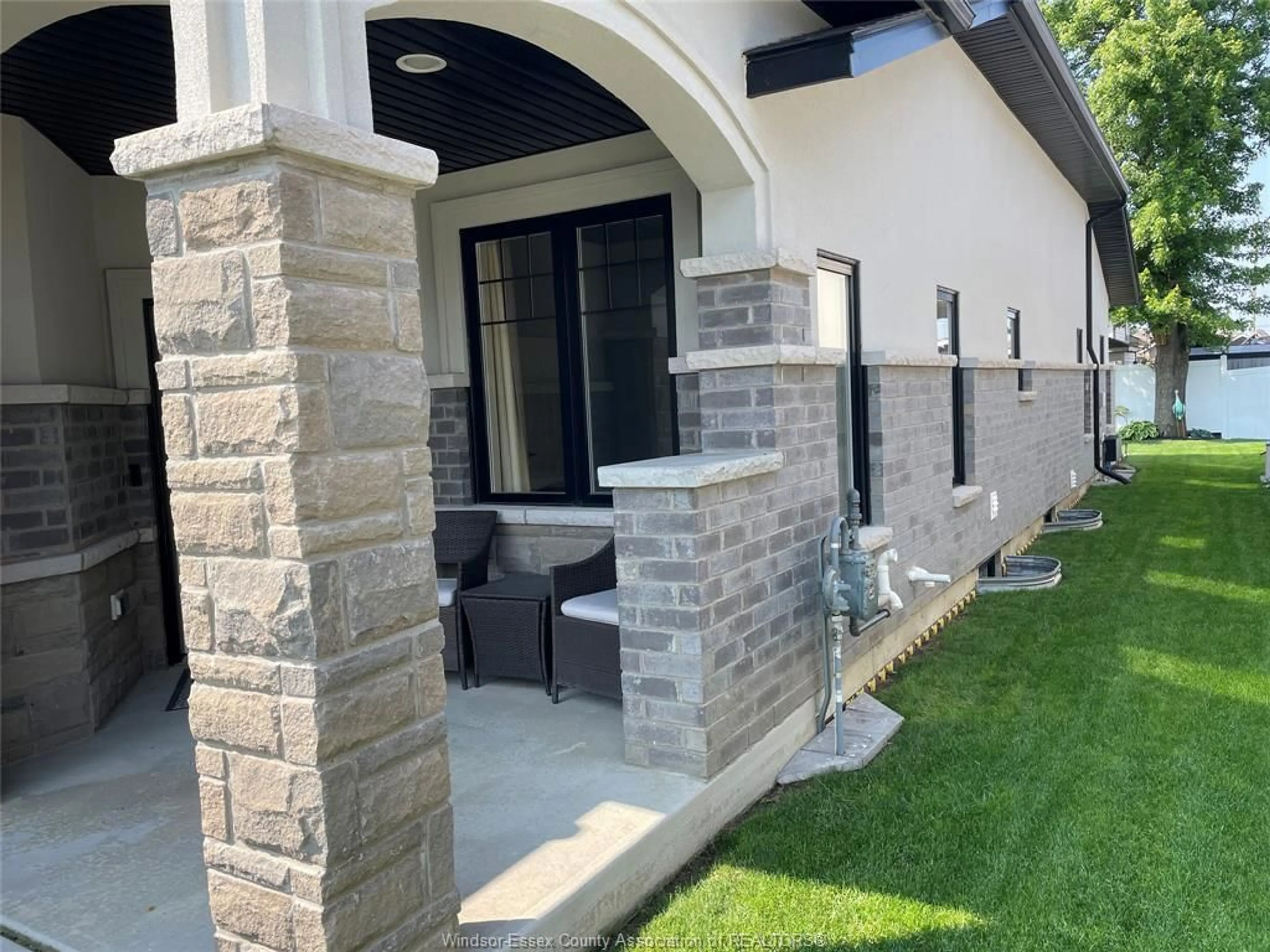 Home with brick exterior material, street for 94 HOUGHTON St, Essex Ontario N8M 0A5