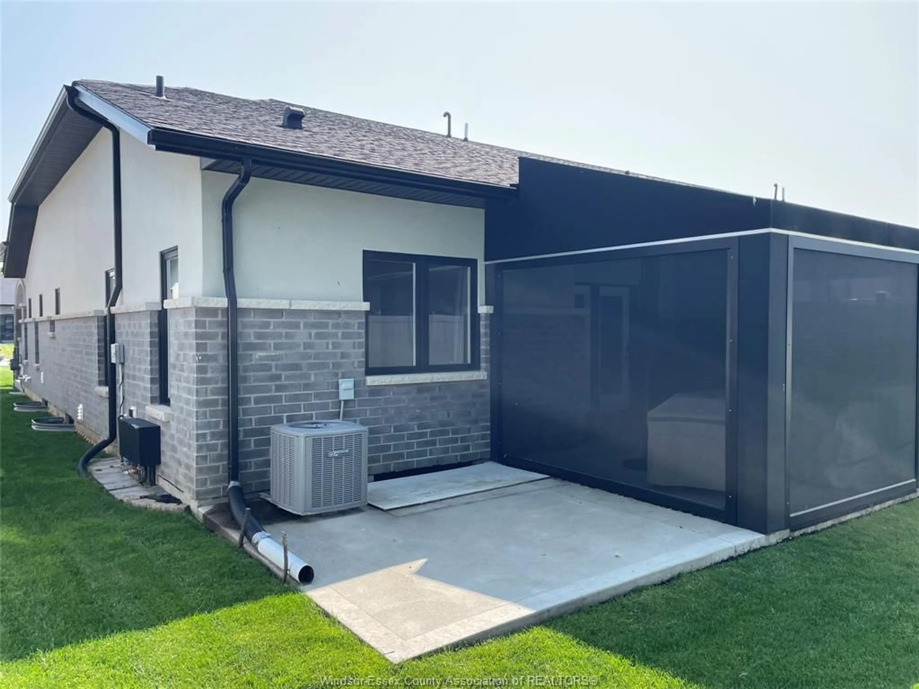 Home with vinyl exterior material, street for 94 HOUGHTON St, Essex Ontario N8M 0A5
