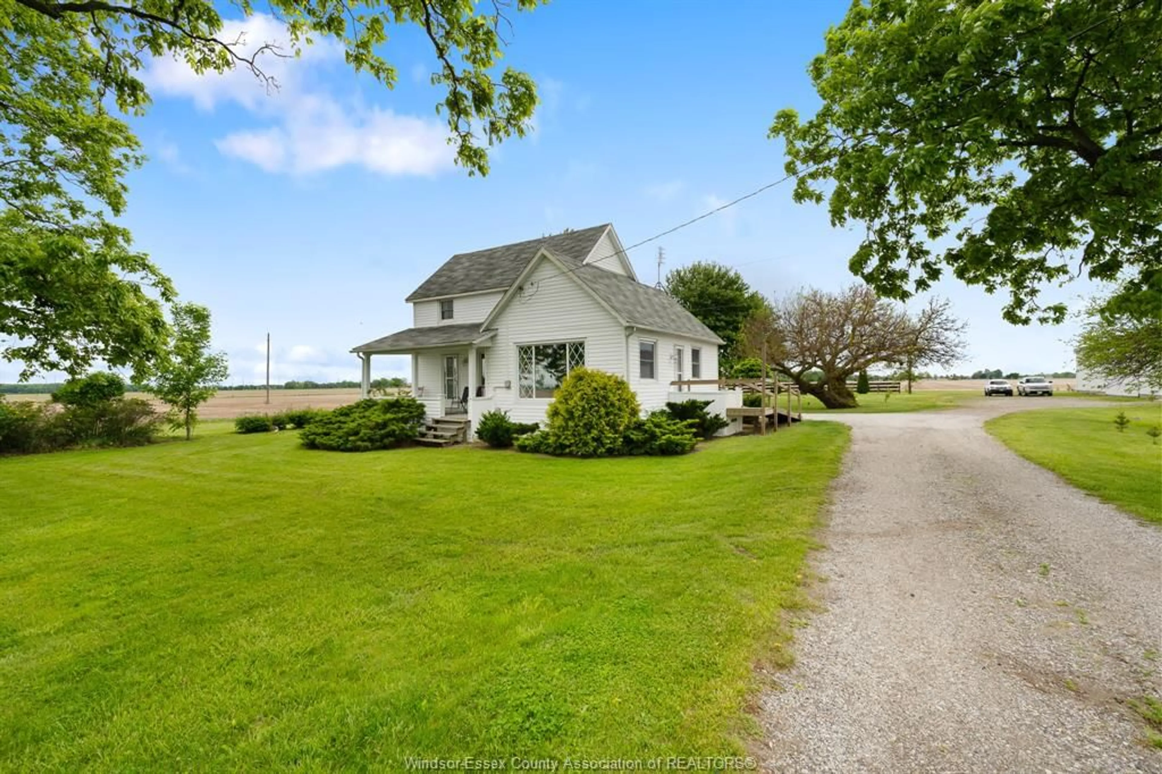 A pic from outside/outdoor area/front of a property/back of a property/a pic from drone, unknown for 712 ROAD 11, Kingsville Ontario N0R 1V0