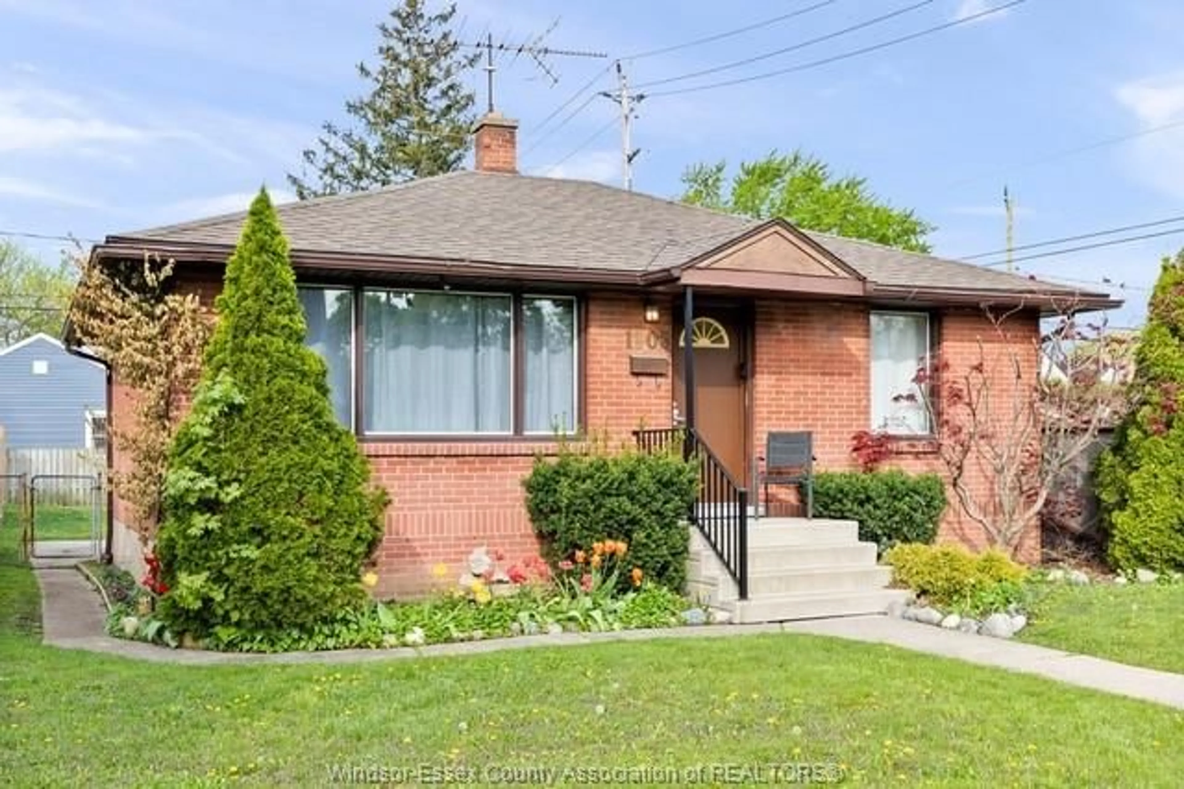 Home with brick exterior material, street for 1105 Harrison, Windsor Ontario N9C 3J4