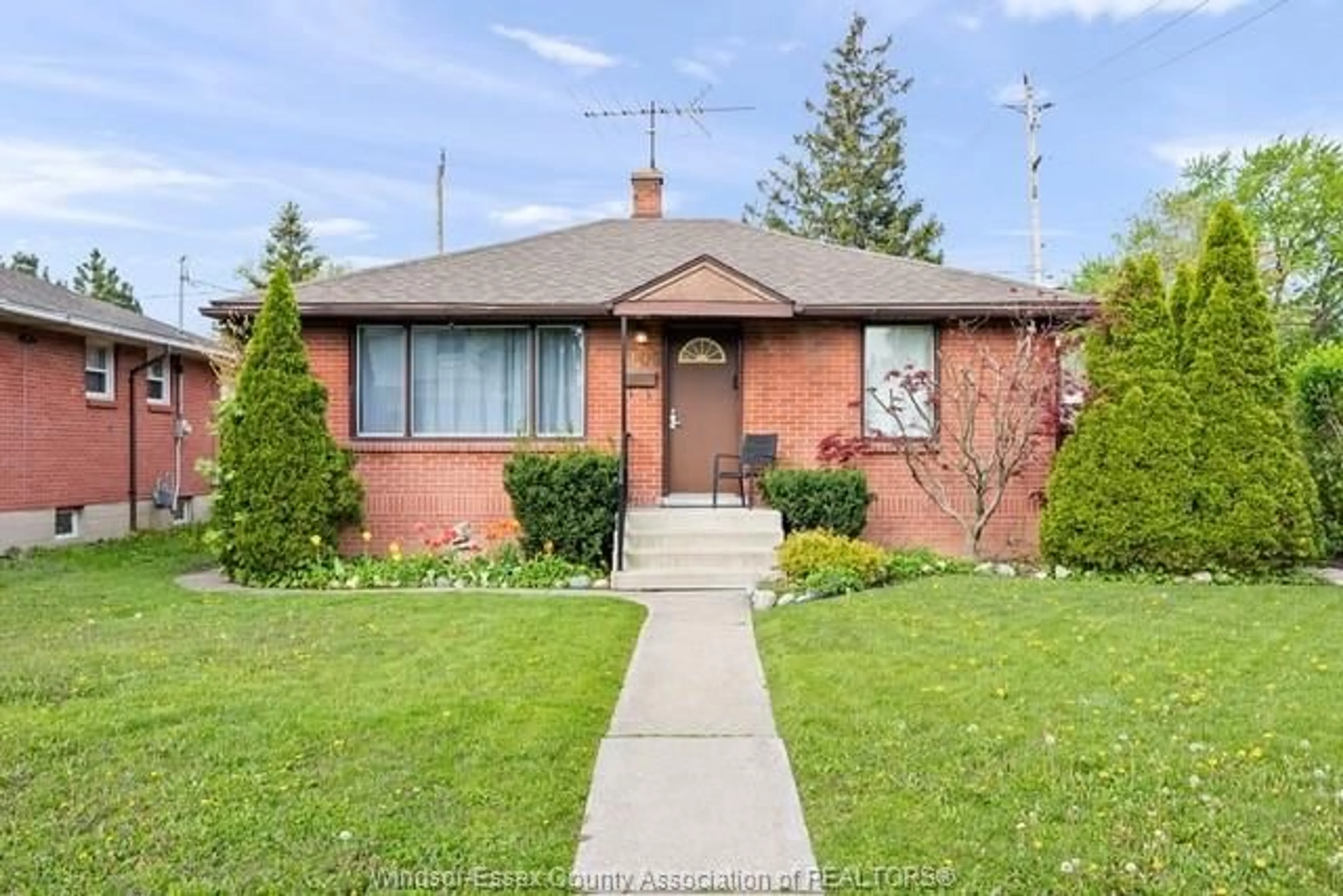 Home with brick exterior material, street for 1105 Harrison, Windsor Ontario N9C 3J4