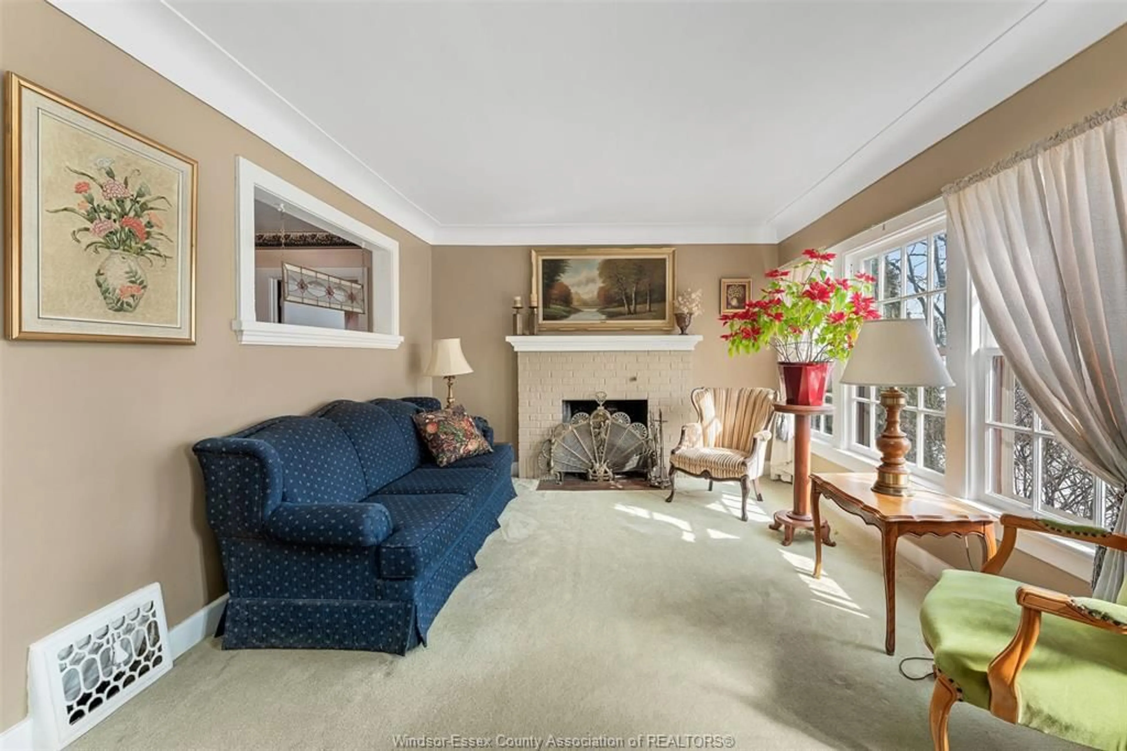 Living room with furniture, carpet floor for 7154 ST. ROSE Ave, Windsor Ontario N8S 1X8