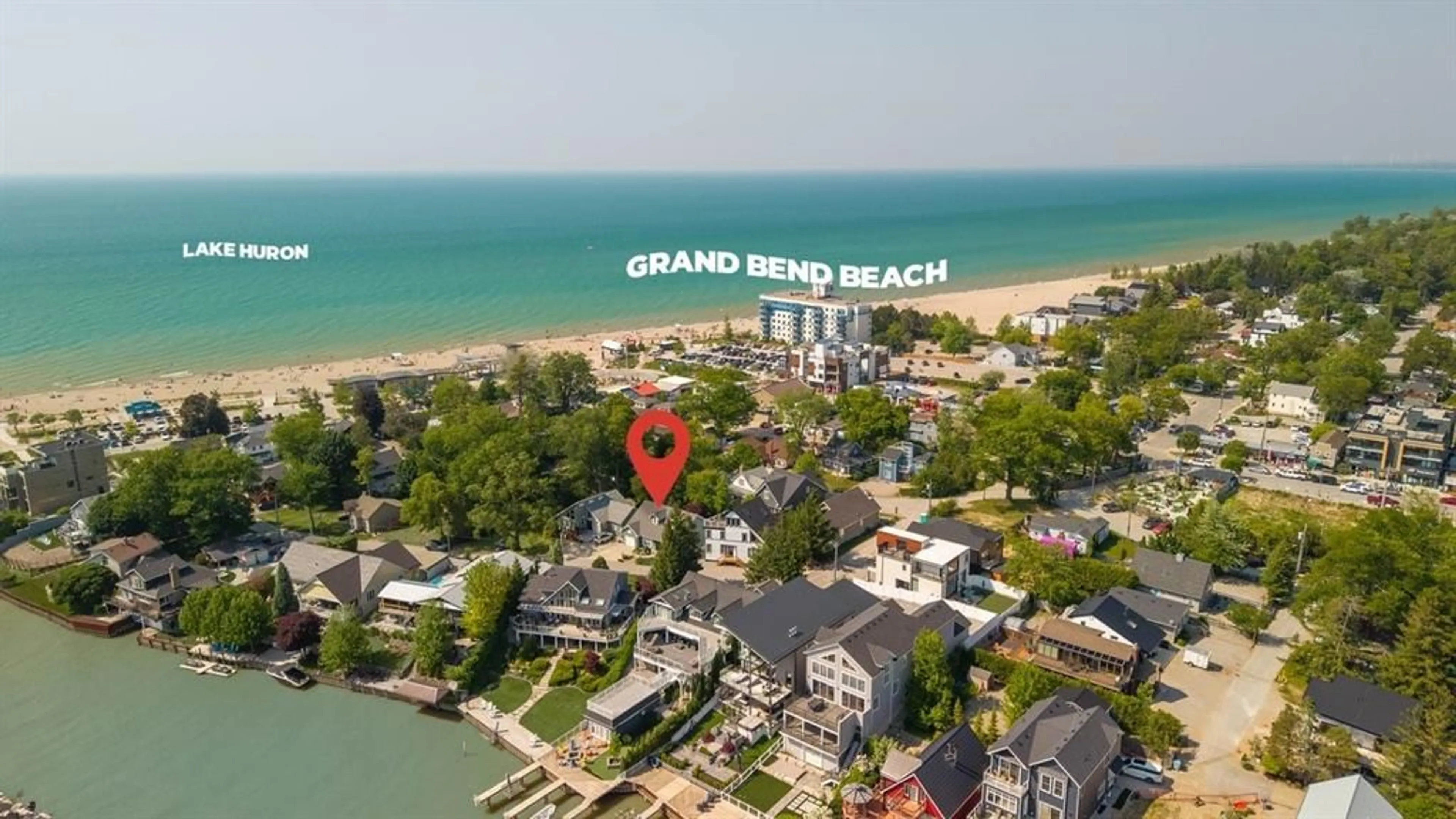 A pic from outside/outdoor area/front of a property/back of a property/a pic from drone, water/lake/river/ocean view for 40 LAKESIDE Cir, Grand Bend Ontario N0M 1T0