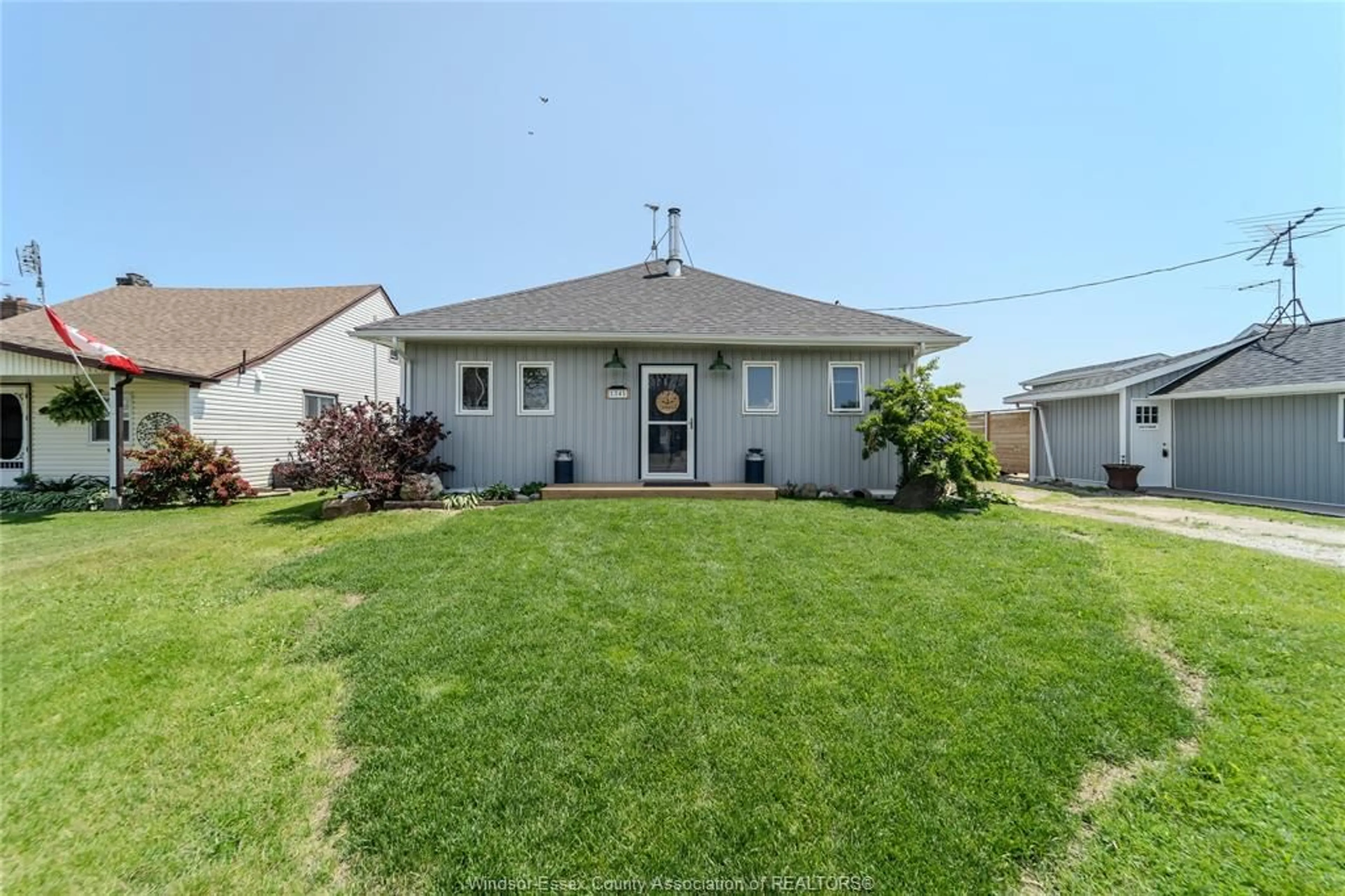 A pic from outside/outdoor area/front of a property/back of a property/a pic from drone, water/lake/river/ocean view for 1341 HERITAGE, Kingsville Ontario N9Y 2E6
